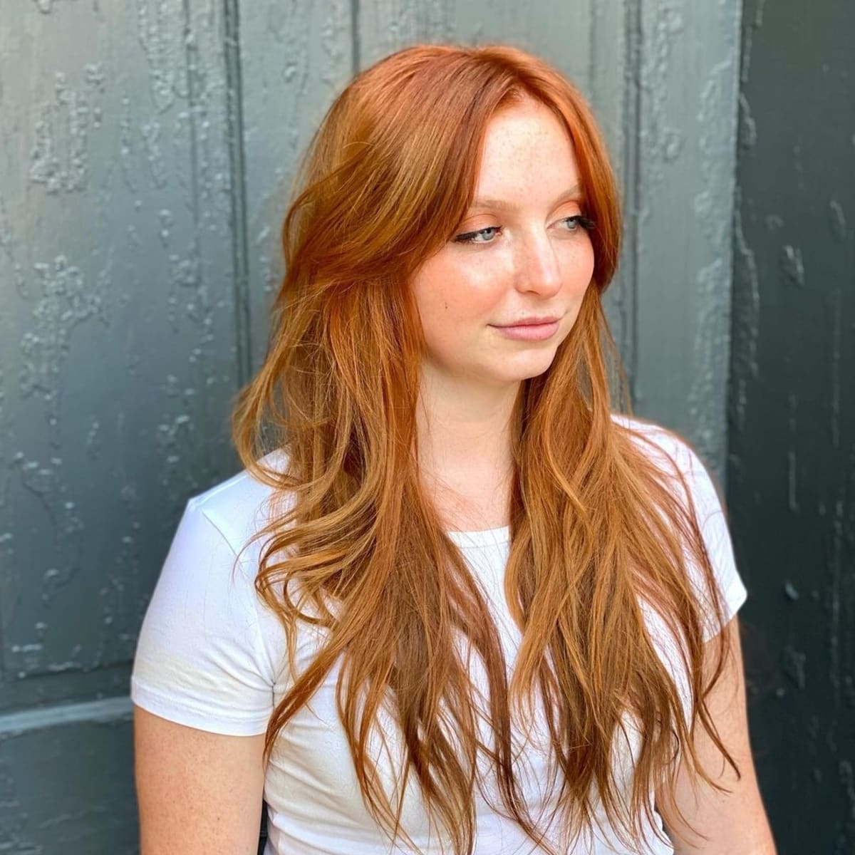 26 Best Ways to Wear Curtain Bangs for Straight Hair, According to Stylists