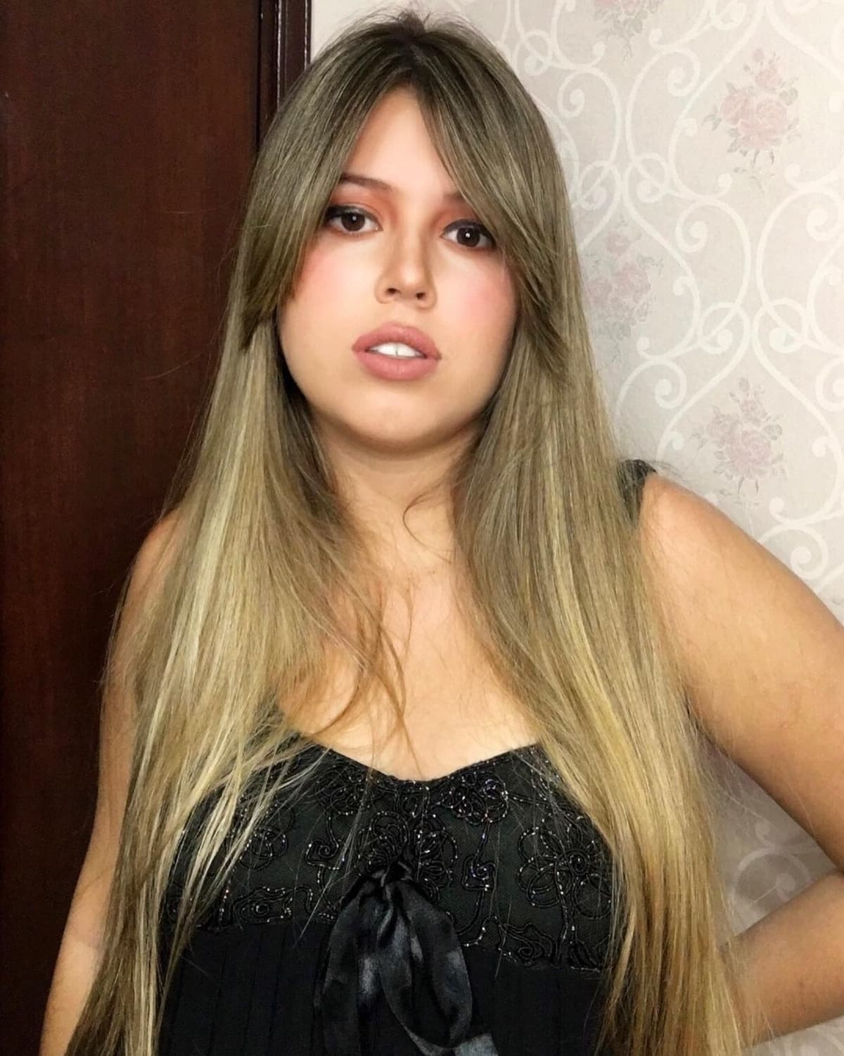 26 Best Ways to Wear Curtain Bangs for Straight Hair, According to Stylists
