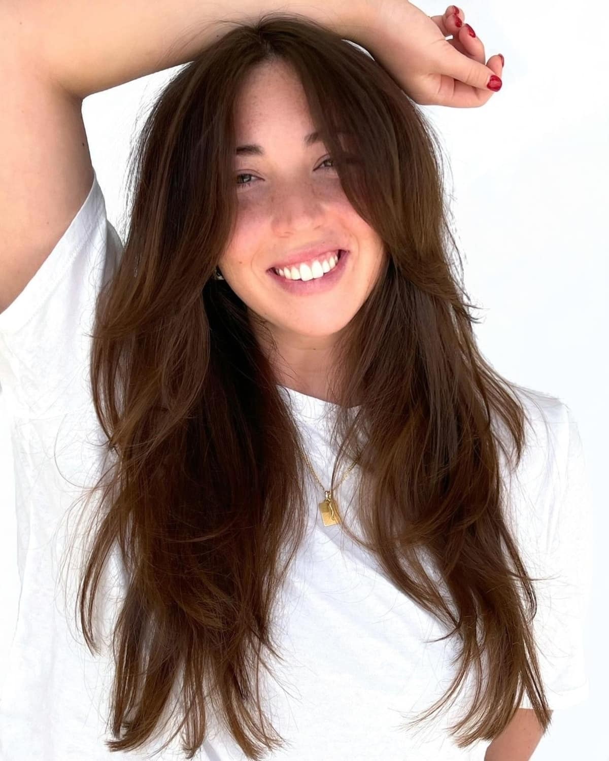 26 Best Ways to Wear Curtain Bangs for Straight Hair, According to Stylists