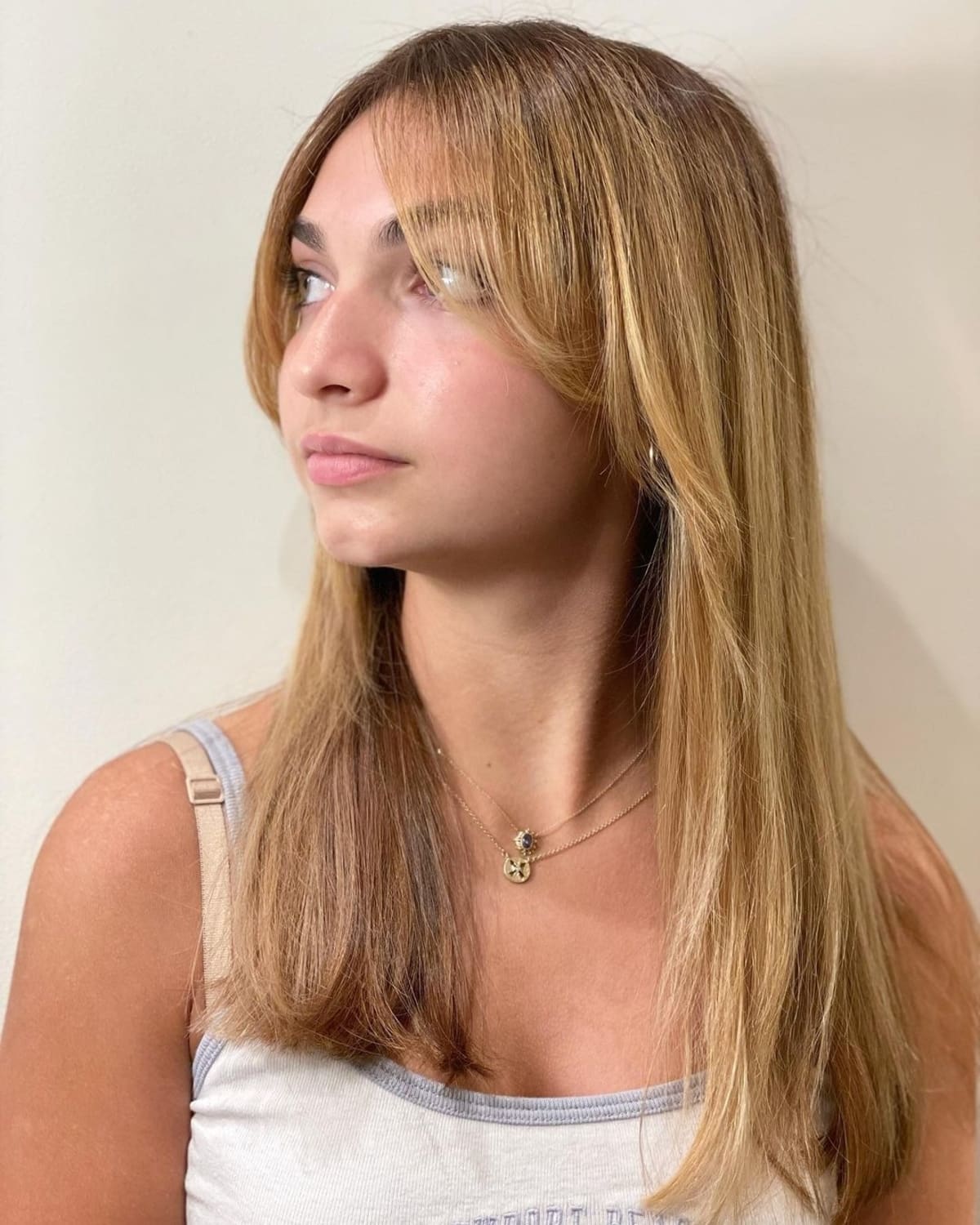 26 Best Ways to Wear Curtain Bangs for Straight Hair, According to Stylists