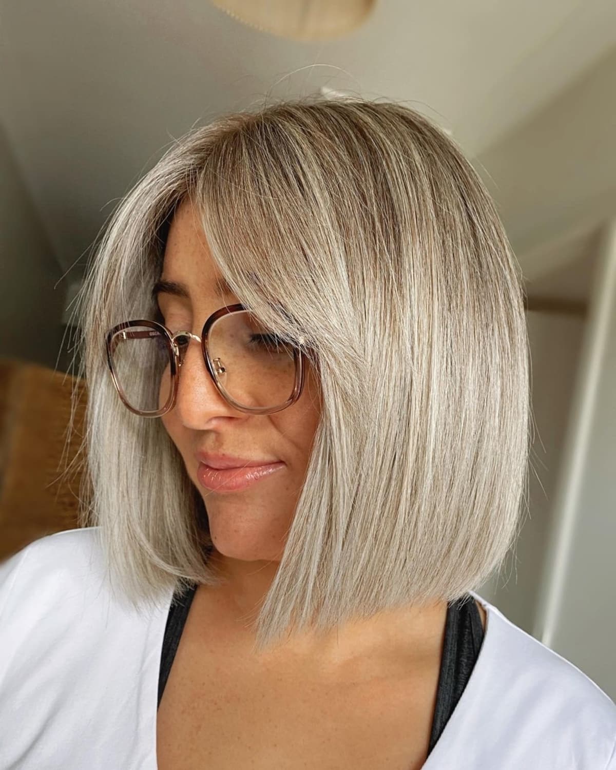 26 Best Ways to Wear Curtain Bangs for Straight Hair, According to Stylists
