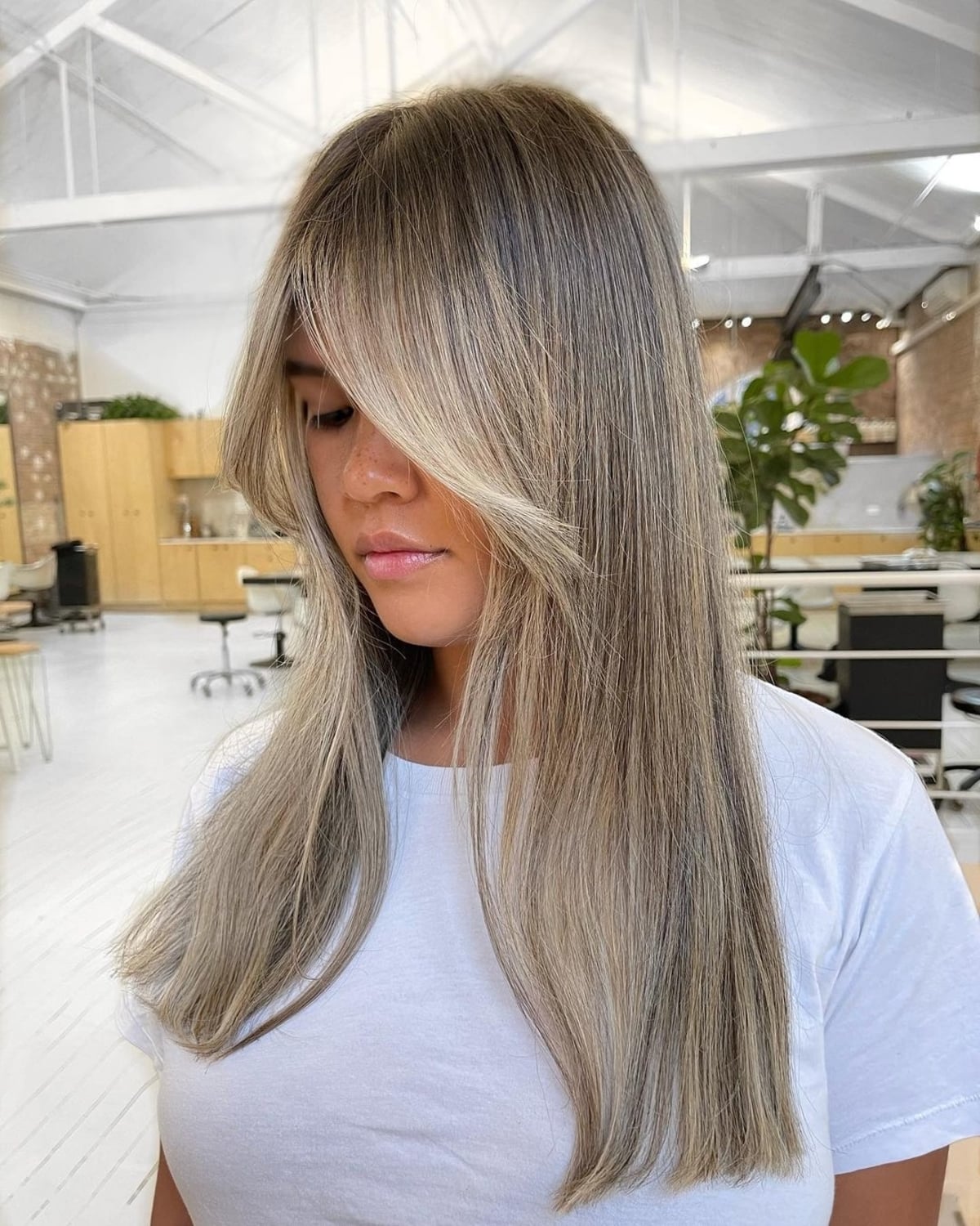 26 Best Ways to Wear Curtain Bangs for Straight Hair, According to Stylists