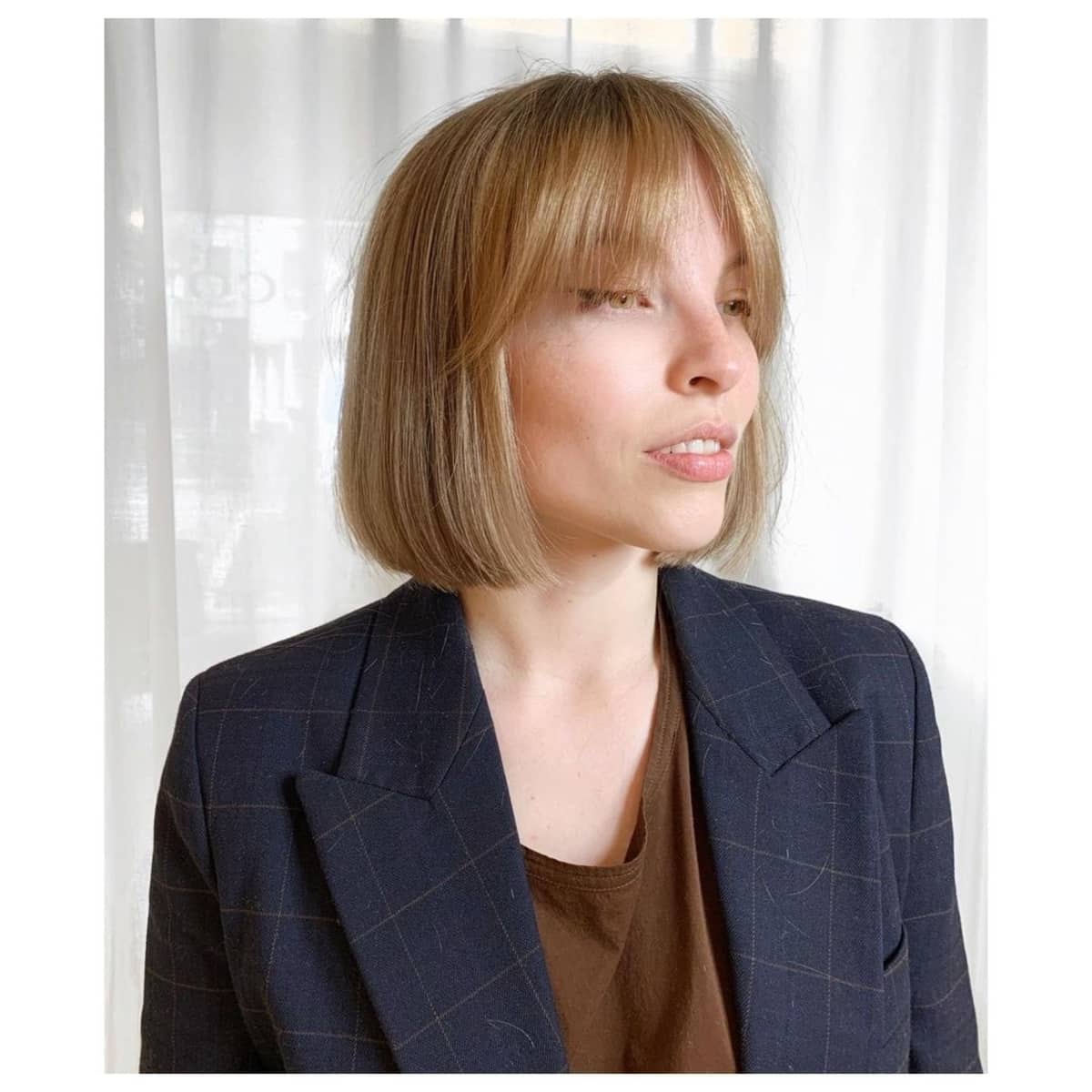 26 Best Ways to Wear Curtain Bangs for Straight Hair, According to Stylists