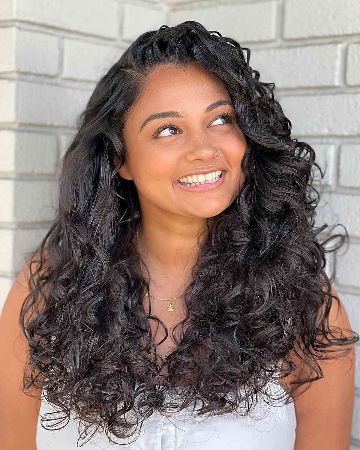 15 Slimming Long Layered Haircuts for Women with Full Faces