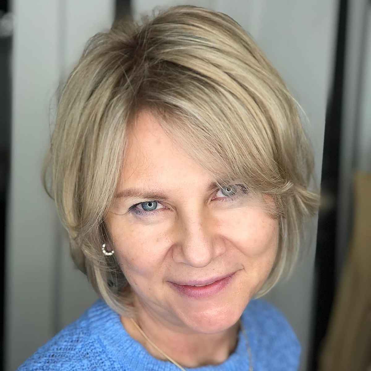 26 Best Ways to Wear Curtain Bangs for a Round Face