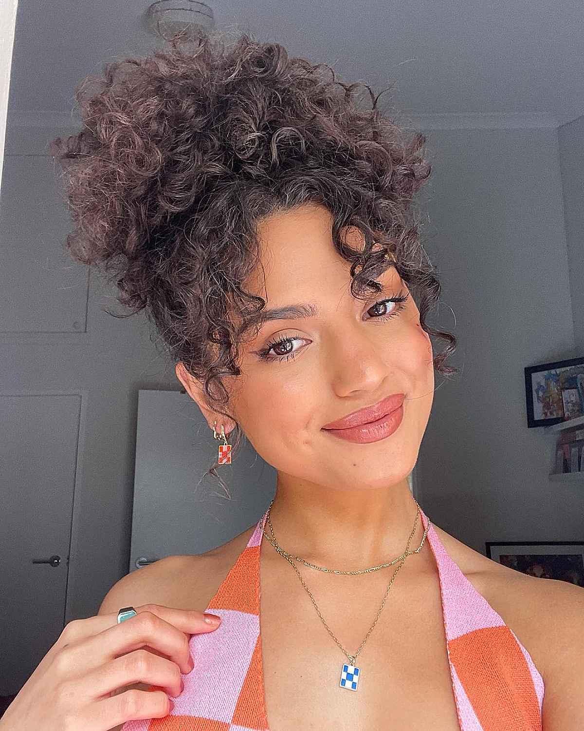 21 Best Ways to Get Curtain Bangs for Curly Hair Right Now