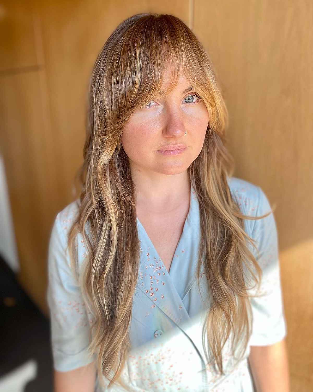 26 Best Ways to Wear Curtain Bangs for a Round Face