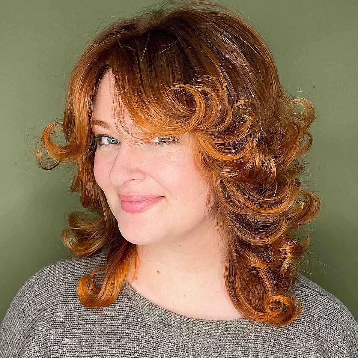 21 Best Ways to Get Curtain Bangs for Curly Hair Right Now