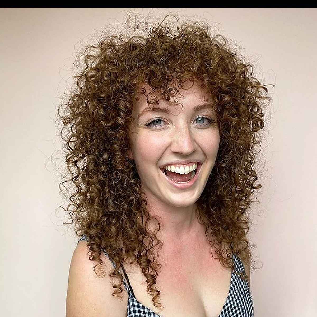 28 Stunning Curly Shag Haircuts for Trendy, Curly-Haired Girls