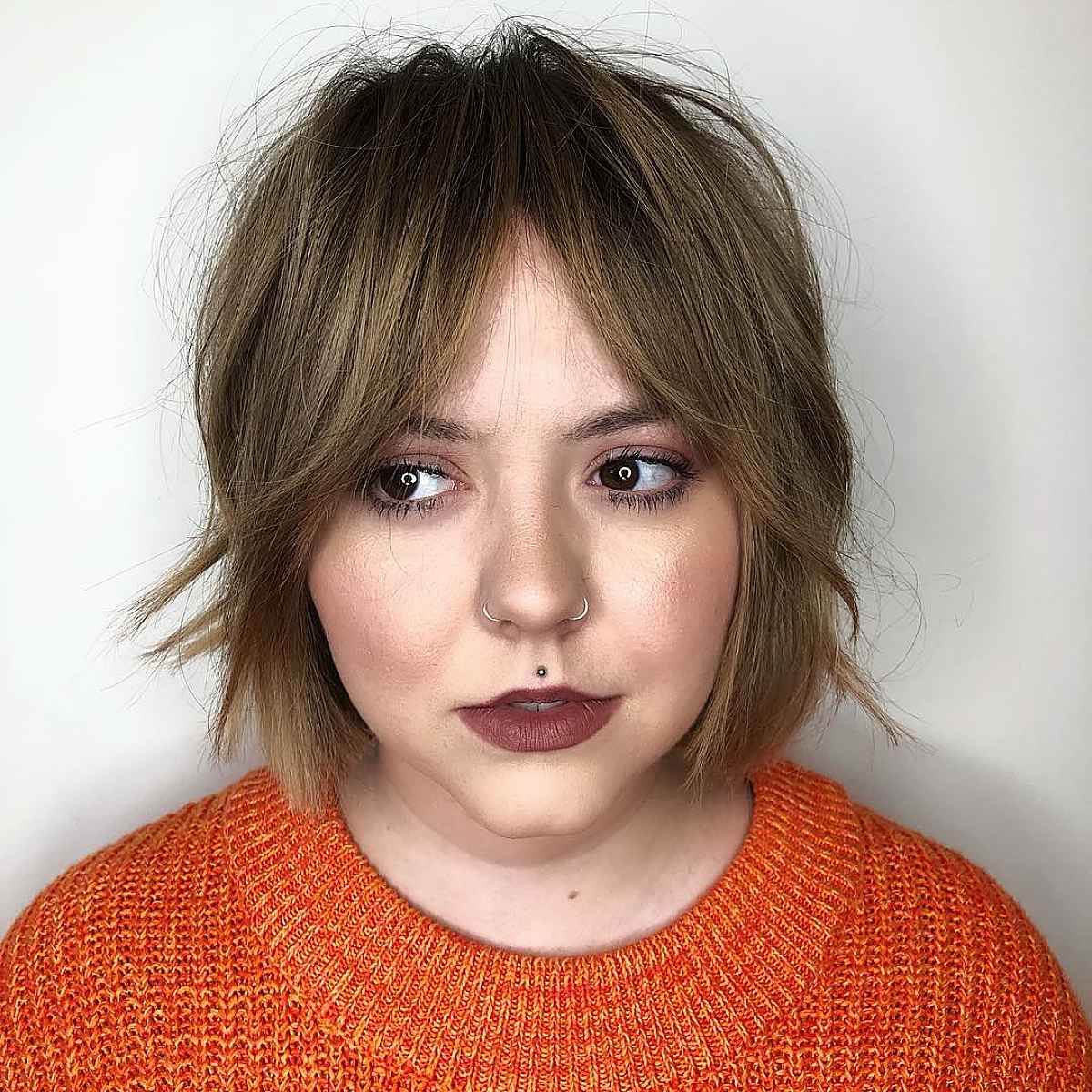 26 Best Ways to Wear Curtain Bangs for a Round Face