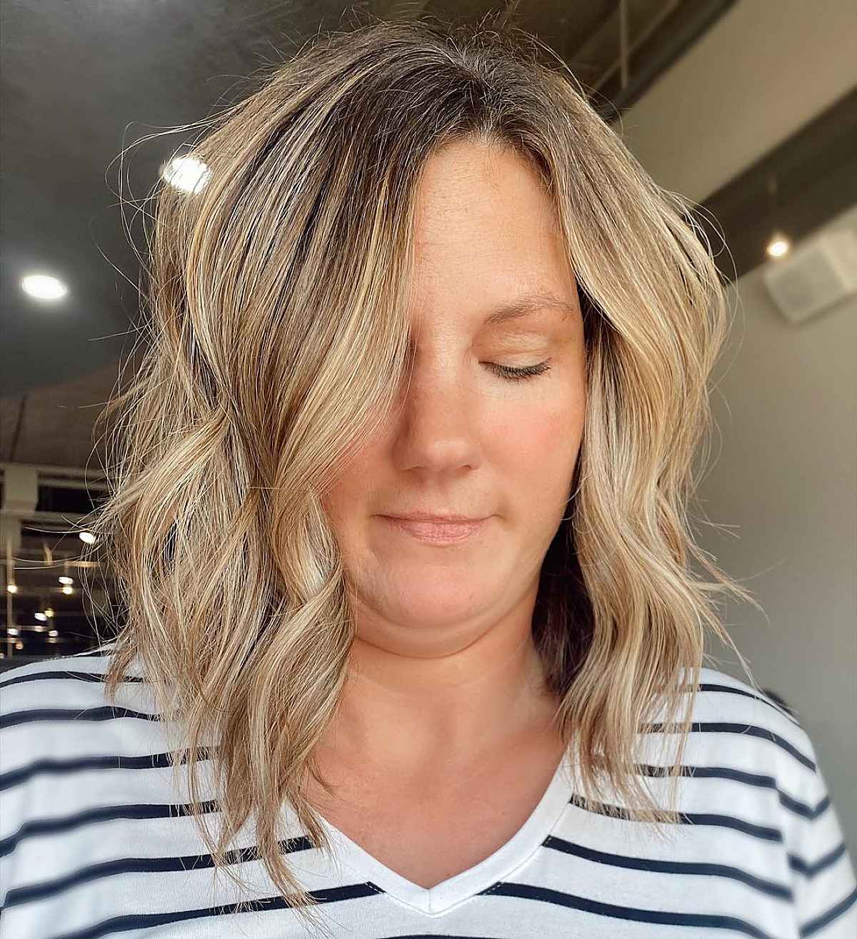 26 Slimming Hairstyles for Women with Full Faces (for Plus-Sized Women)