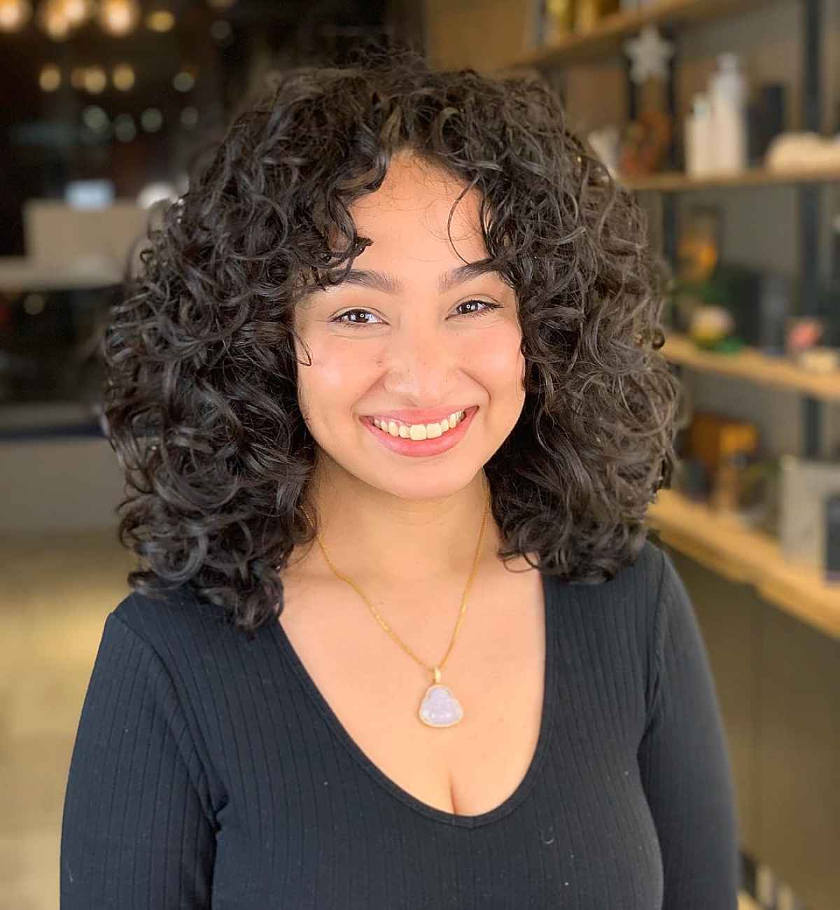 21 Best Ways to Get Curtain Bangs for Curly Hair Right Now