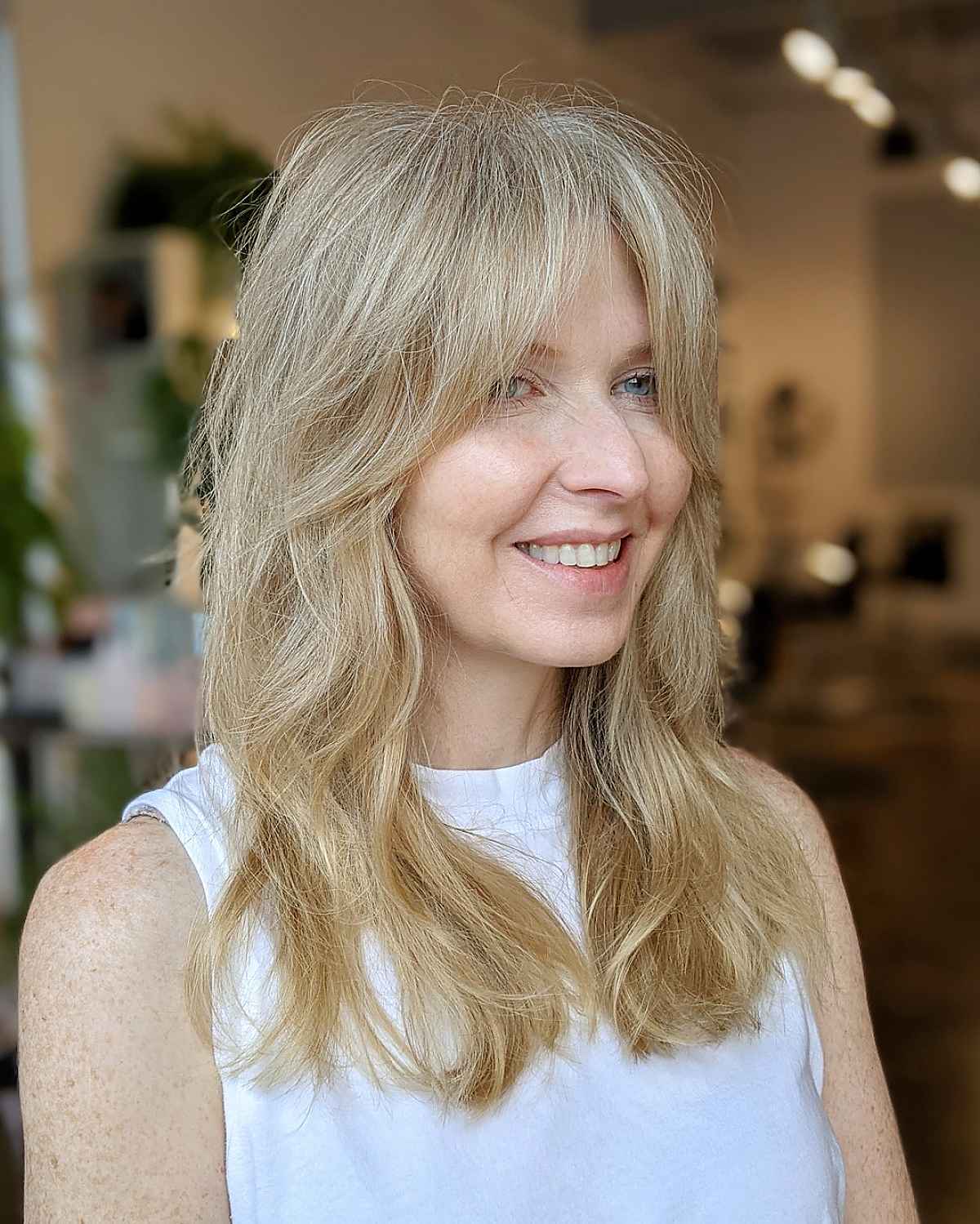 26 Best Ways to Wear Curtain Bangs for a Round Face