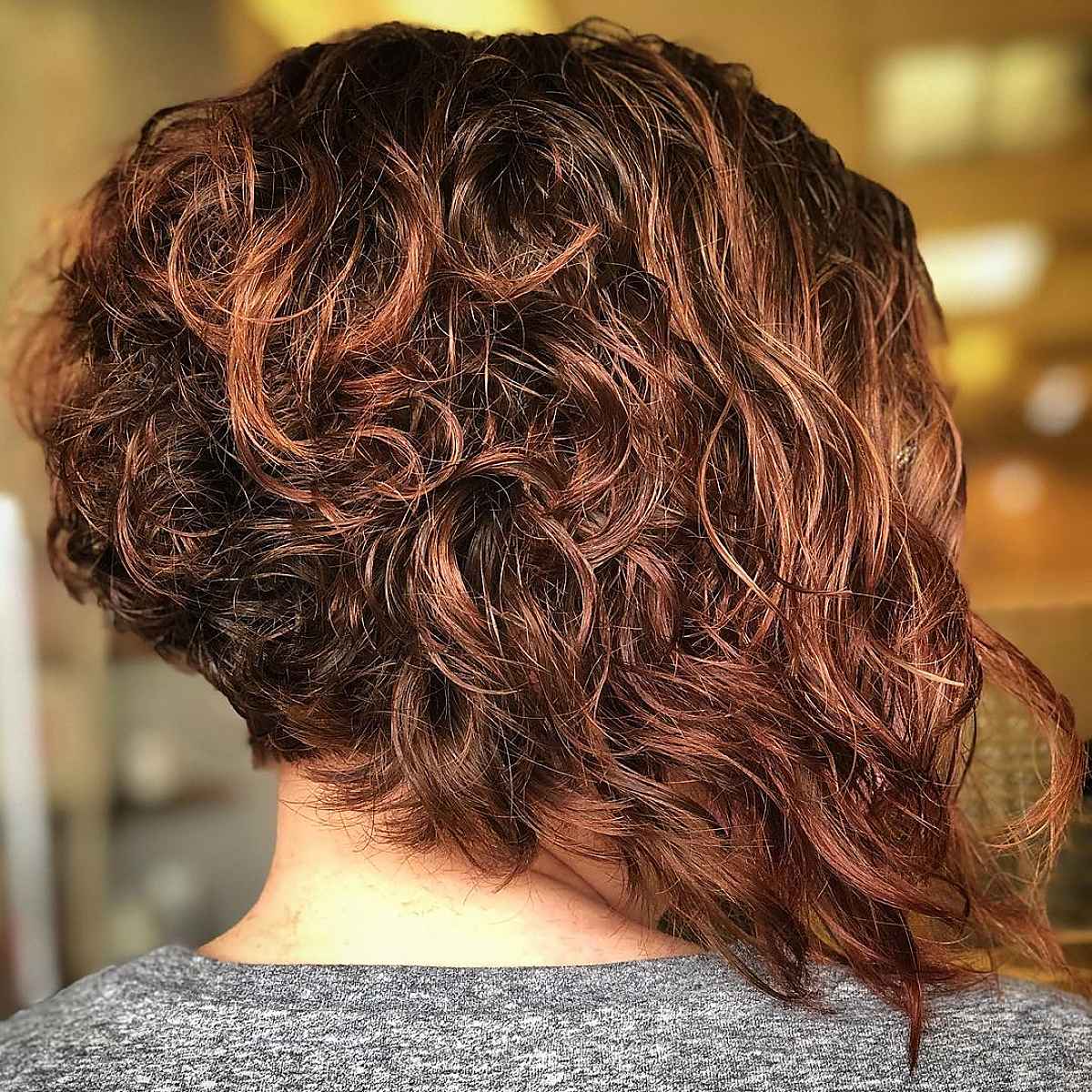 15 Stacked, Short Curly Bob Haircuts to Enhance Your Natural Curls