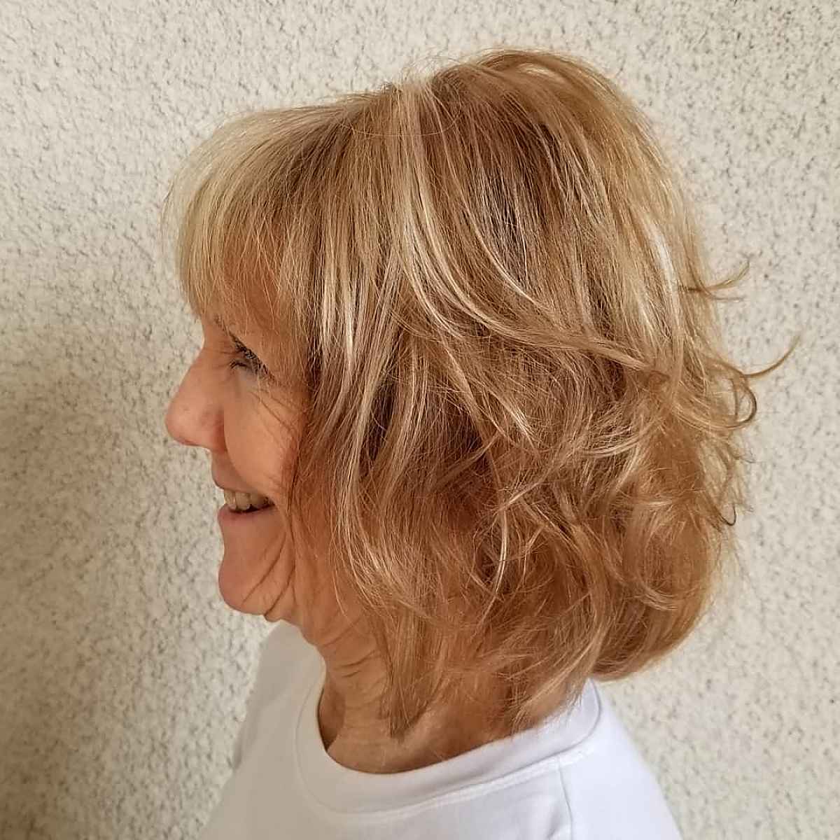 26 Ways to Pair Wavy Hair with Bangs for a Super-Flattering Look