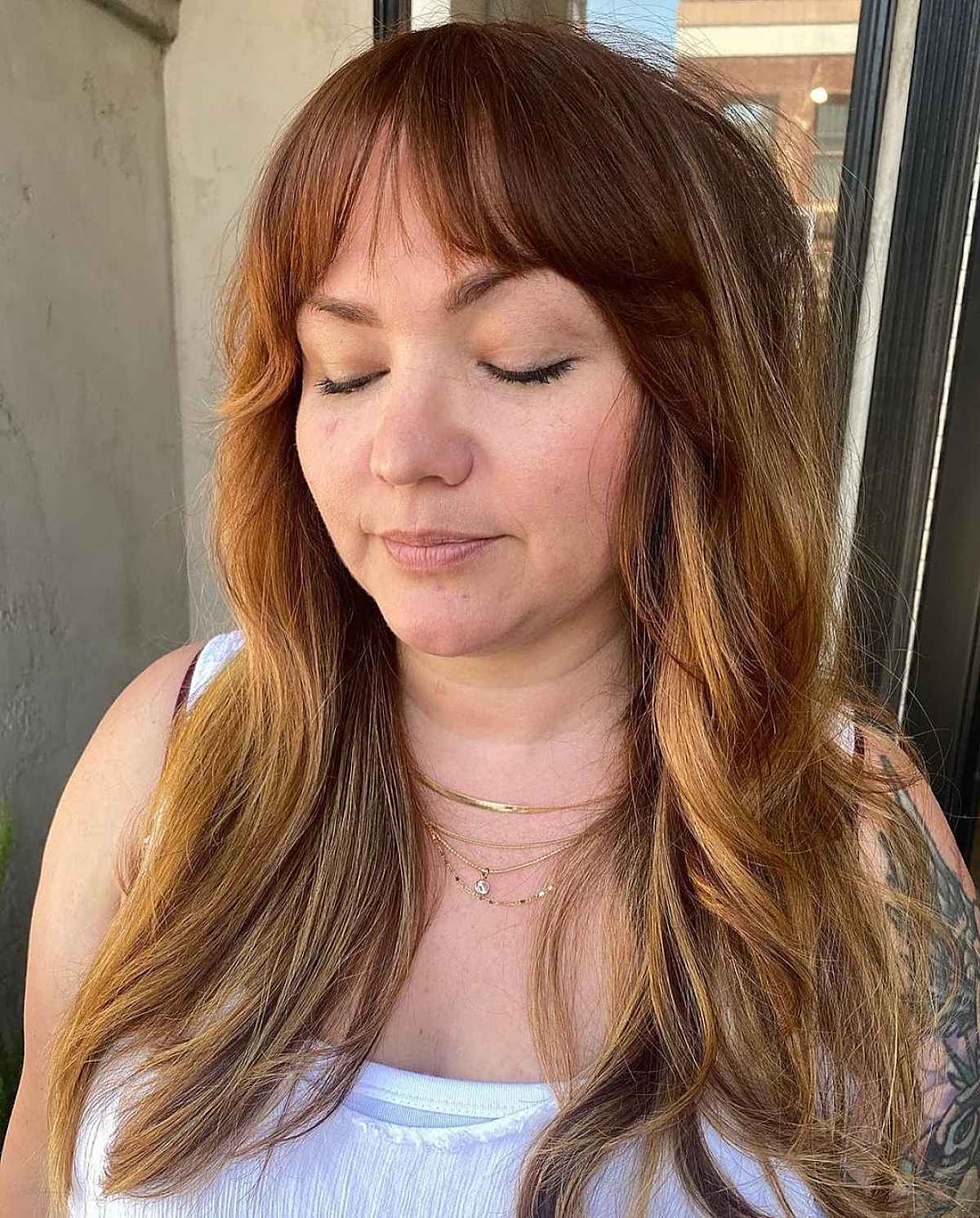 26 Best Ways to Wear Curtain Bangs for a Round Face