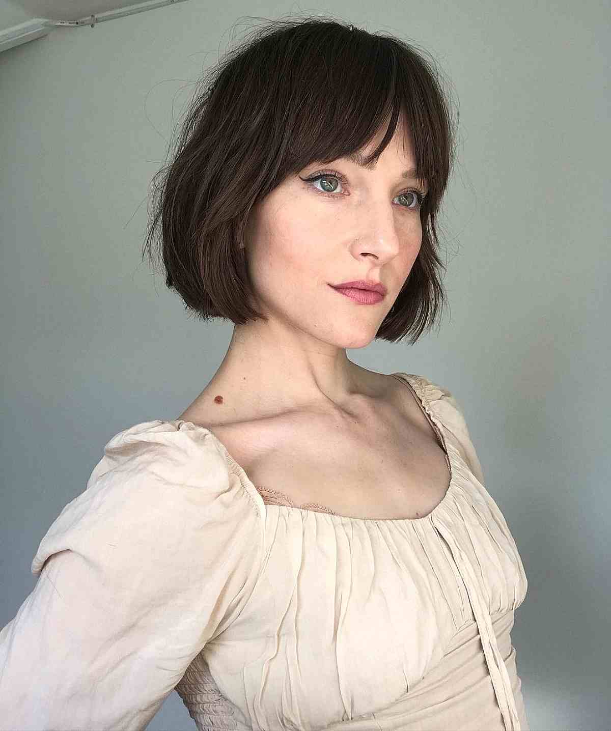 24 Coolest Jaw-Length Choppy Bob with Bangs for a Mod Look