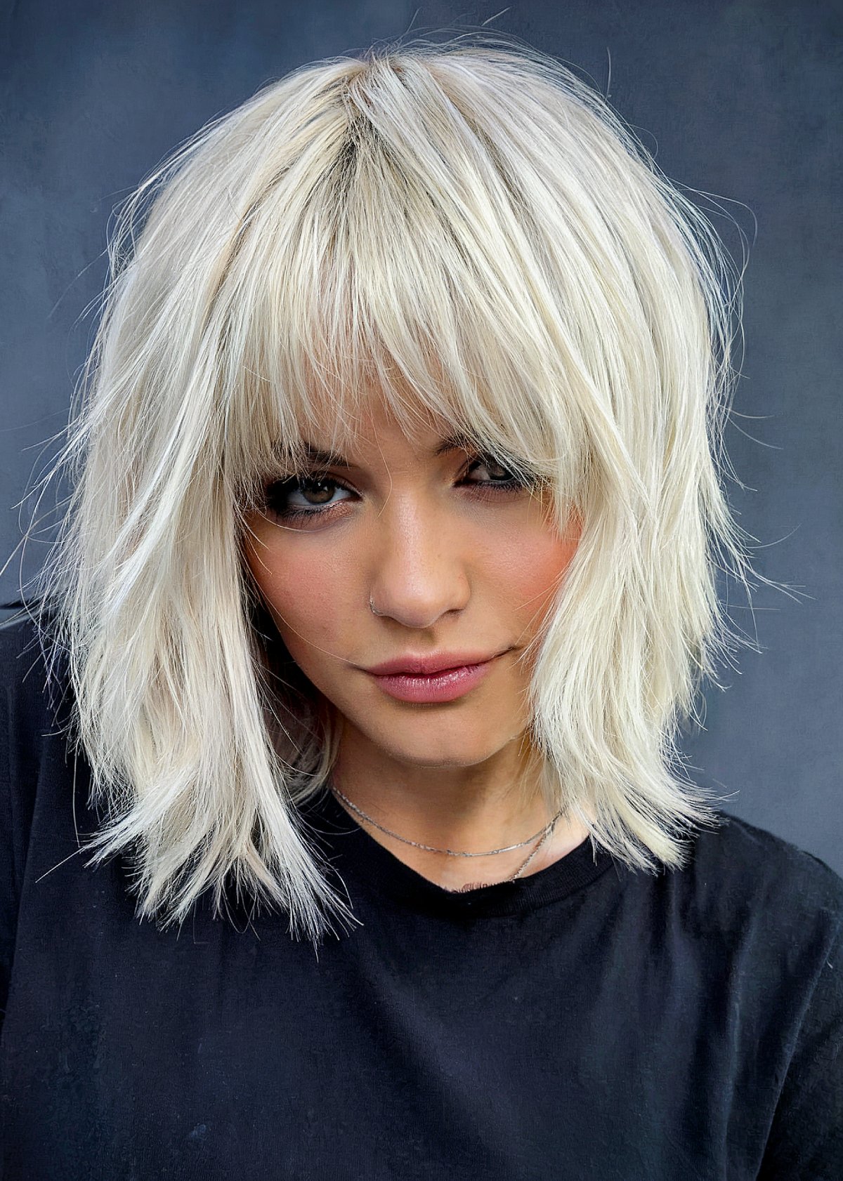 35 Trendy Choppy Bob with Bangs for a Modern Beachy Style