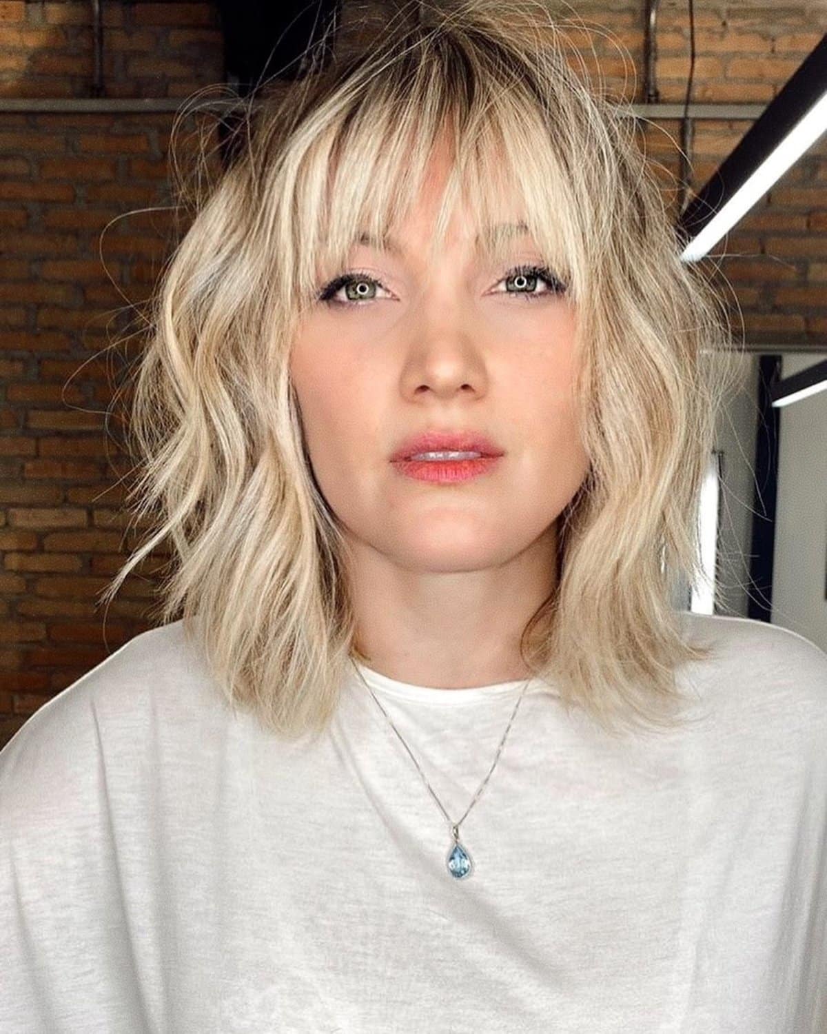 35 Trendy Choppy Bob with Bangs for a Modern Beachy Style