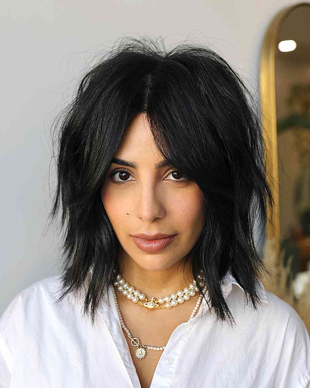35 Trendy Choppy Bob with Bangs for a Modern Beachy Style