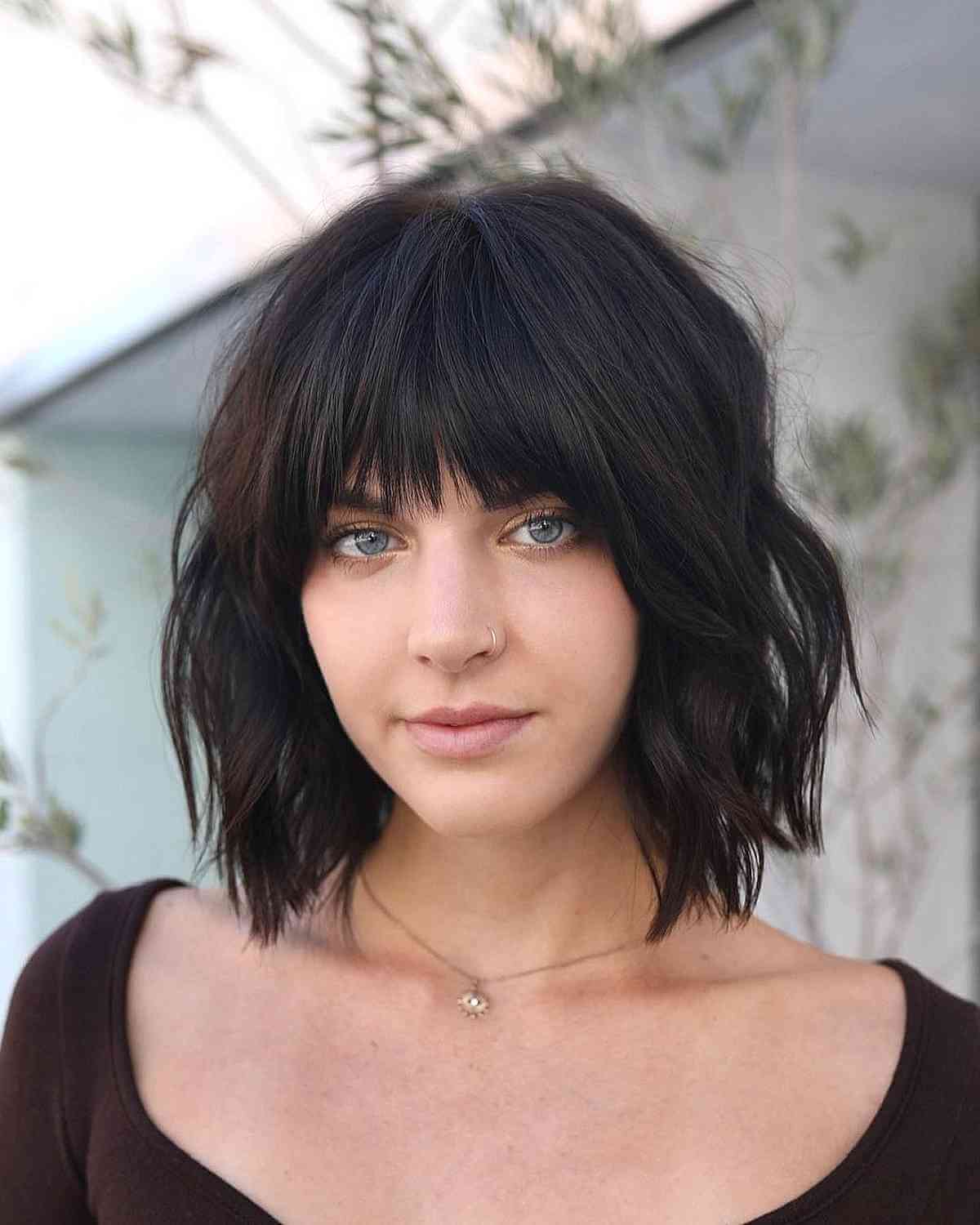 35 Trendy Choppy Bob with Bangs for a Modern Beachy Style