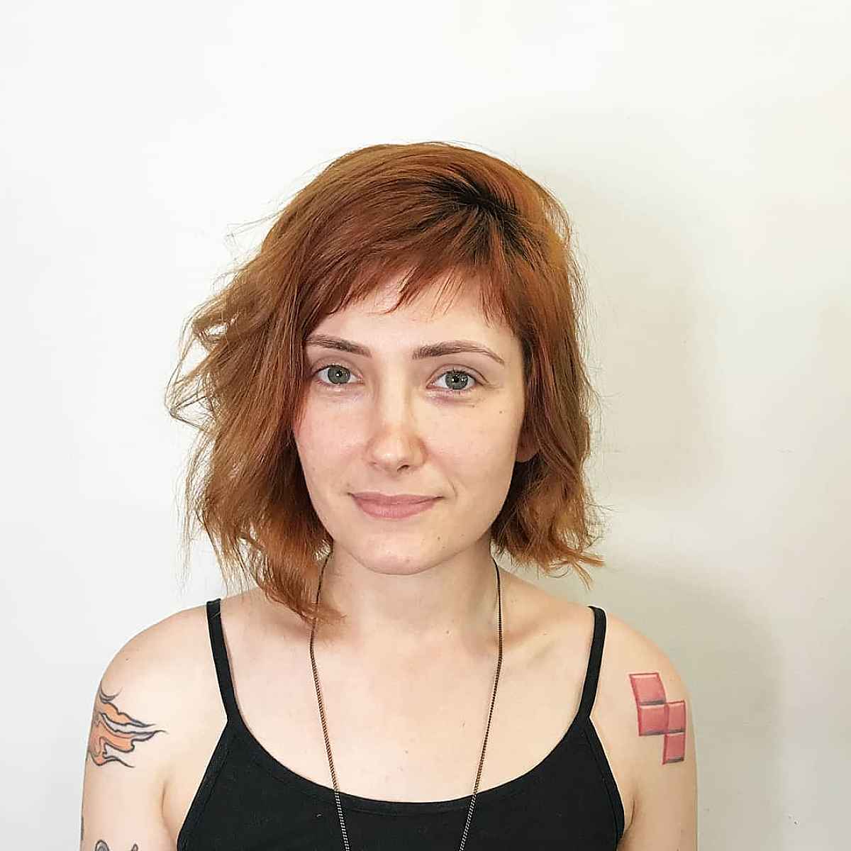 35 Trendy Choppy Bob with Bangs for a Modern Beachy Style