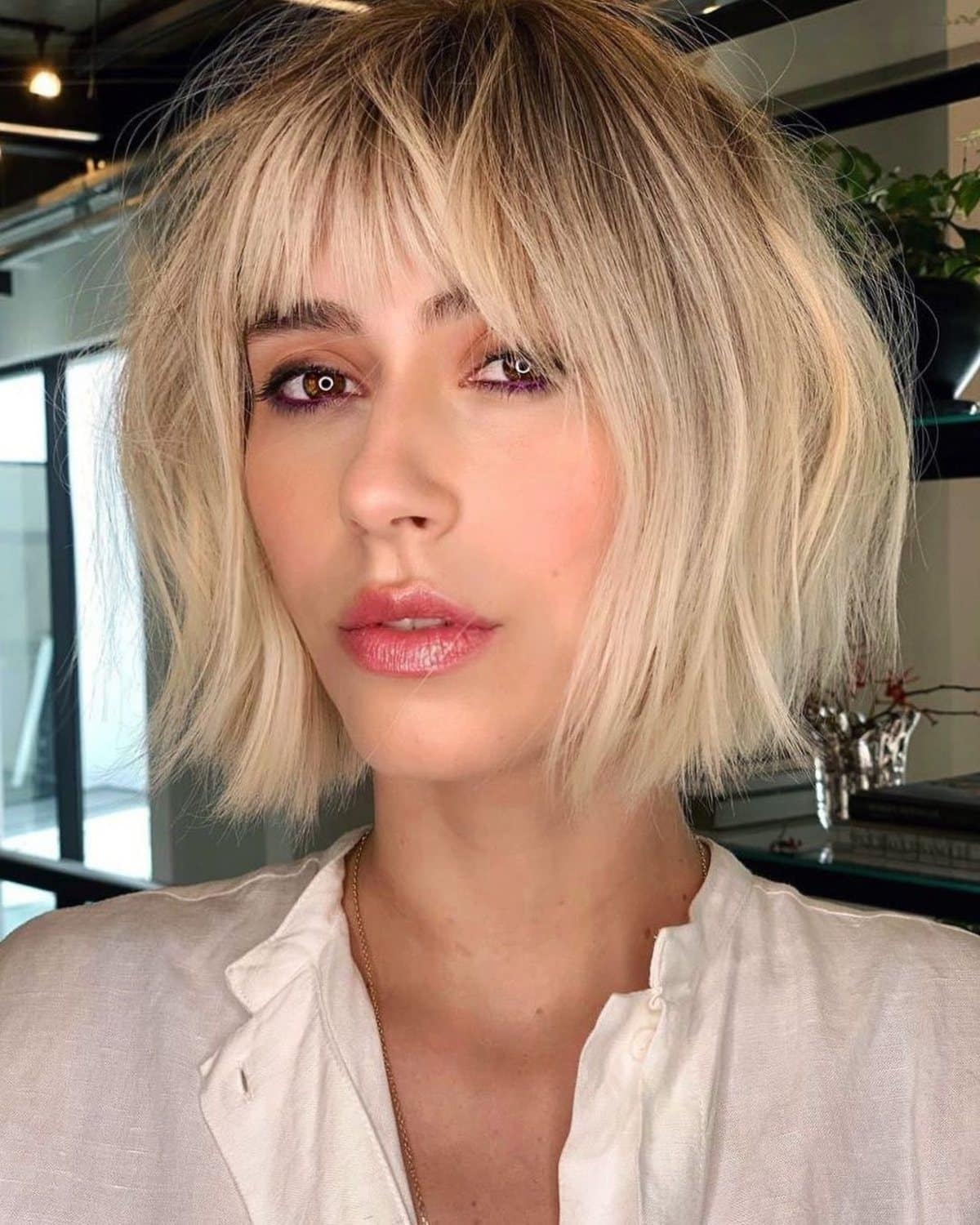 35 Trendy Choppy Bob with Bangs for a Modern Beachy Style