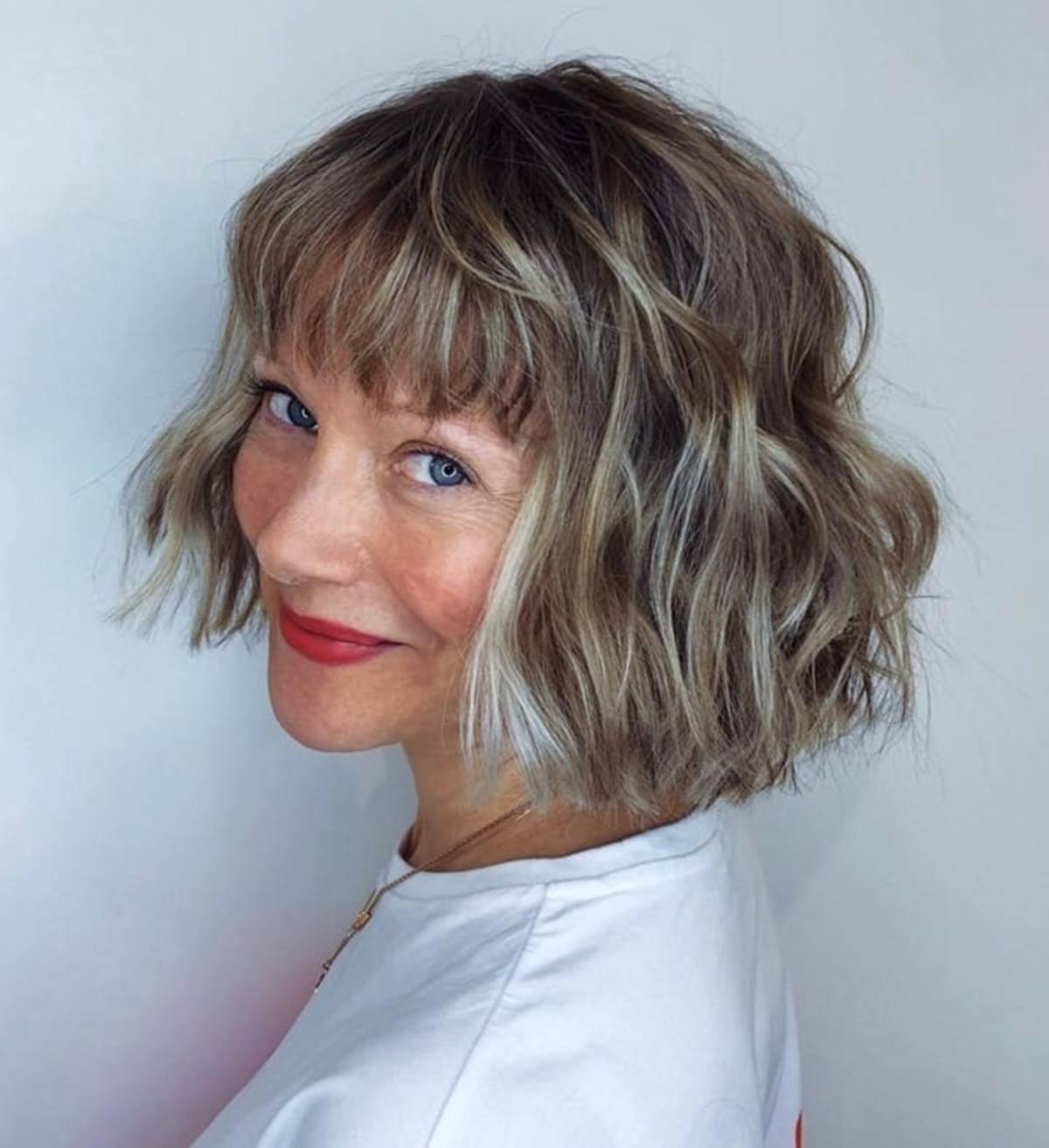 35 Trendy Choppy Bob with Bangs for a Modern Beachy Style
