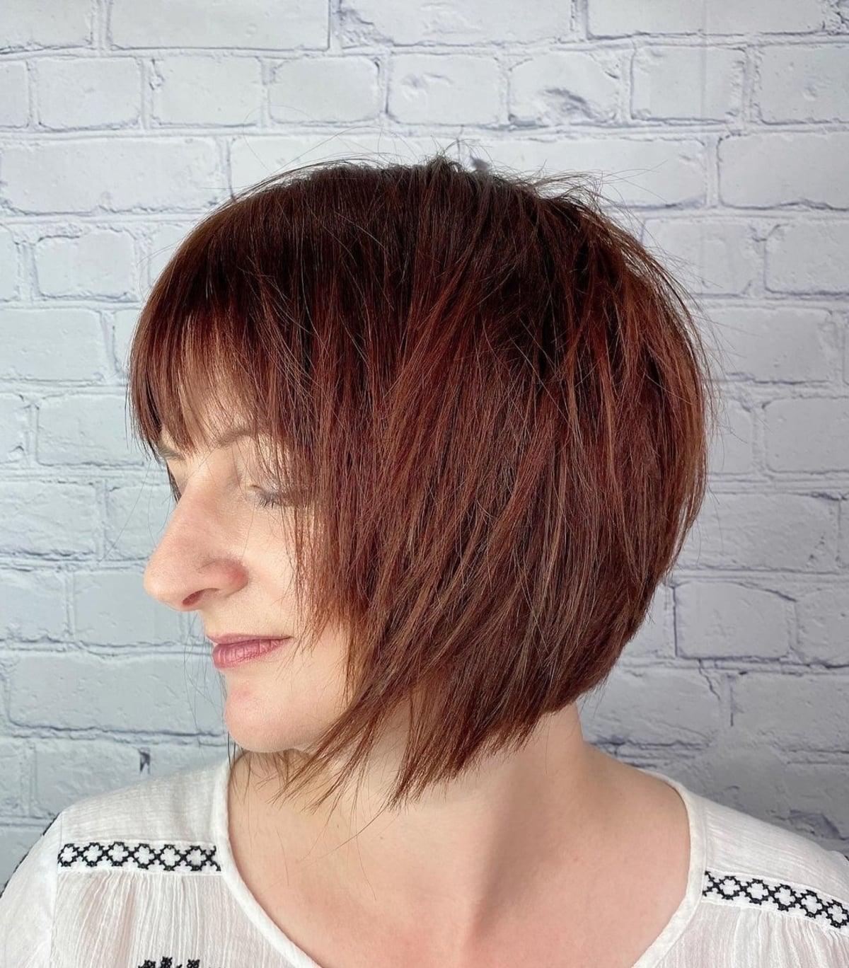 35 Trendy Choppy Bob with Bangs for a Modern Beachy Style