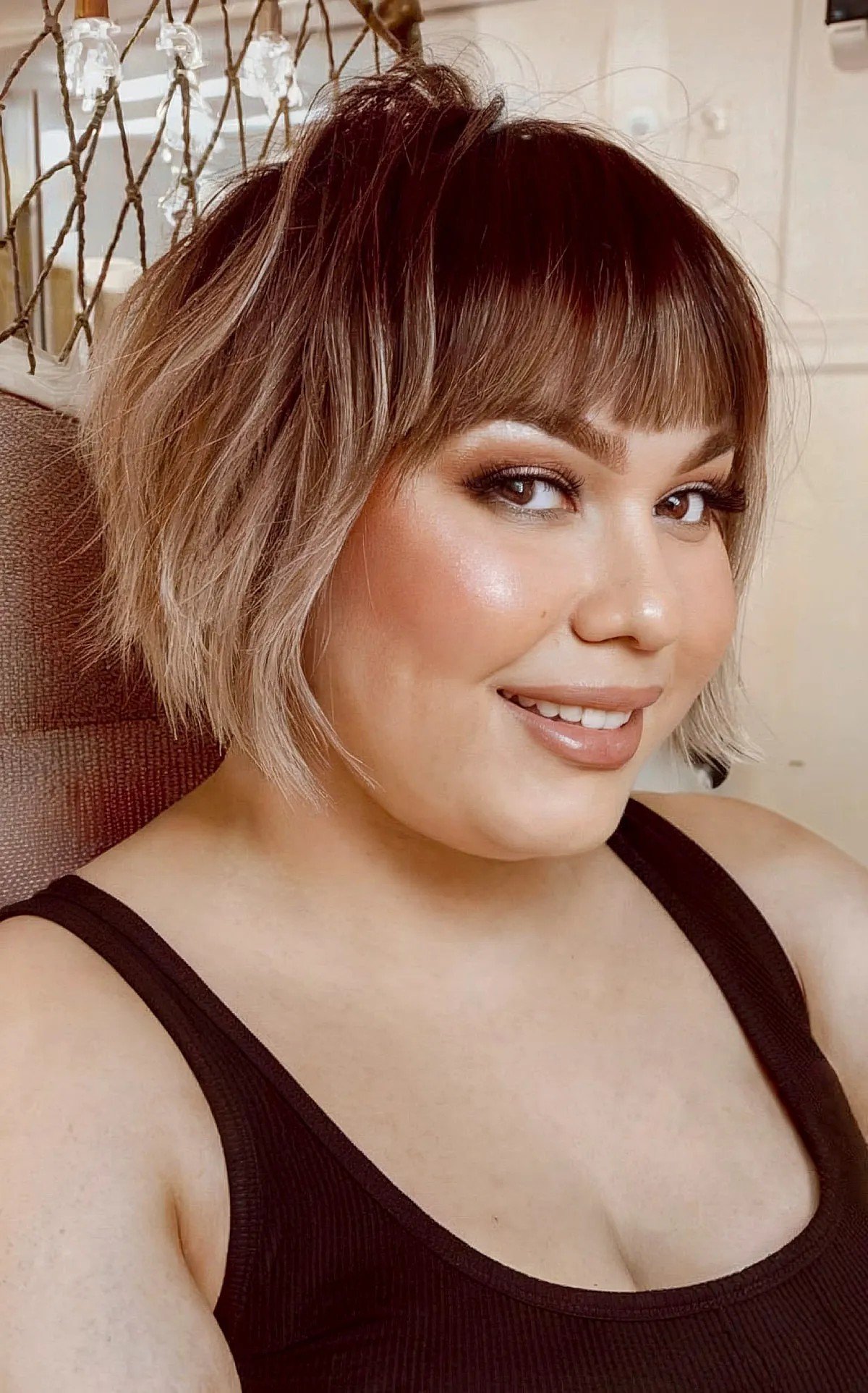 27 Flattering Bob Cuts with Bangs for Women with Round Faces