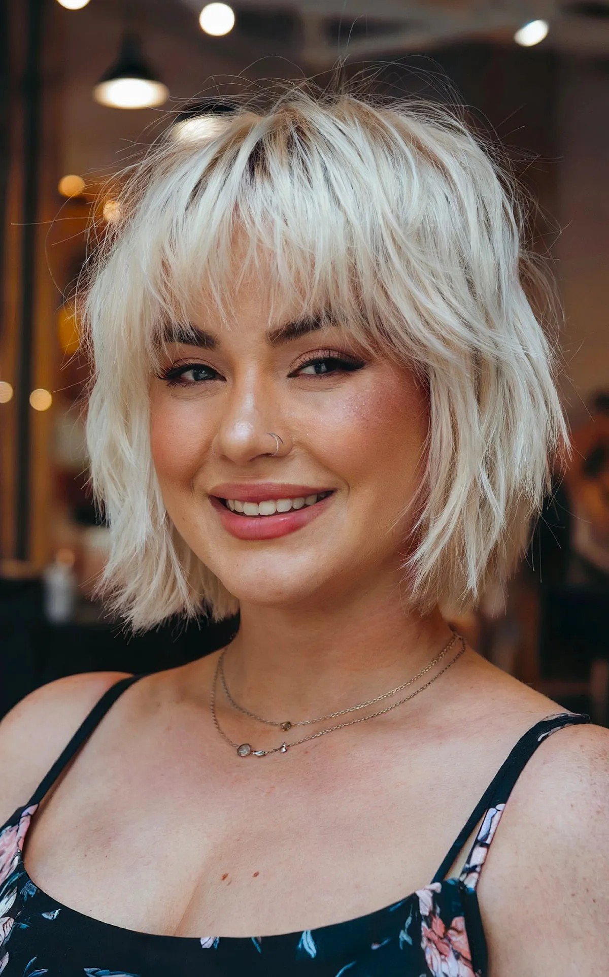 27 Flattering Bob Cuts with Bangs for Women with Round Faces