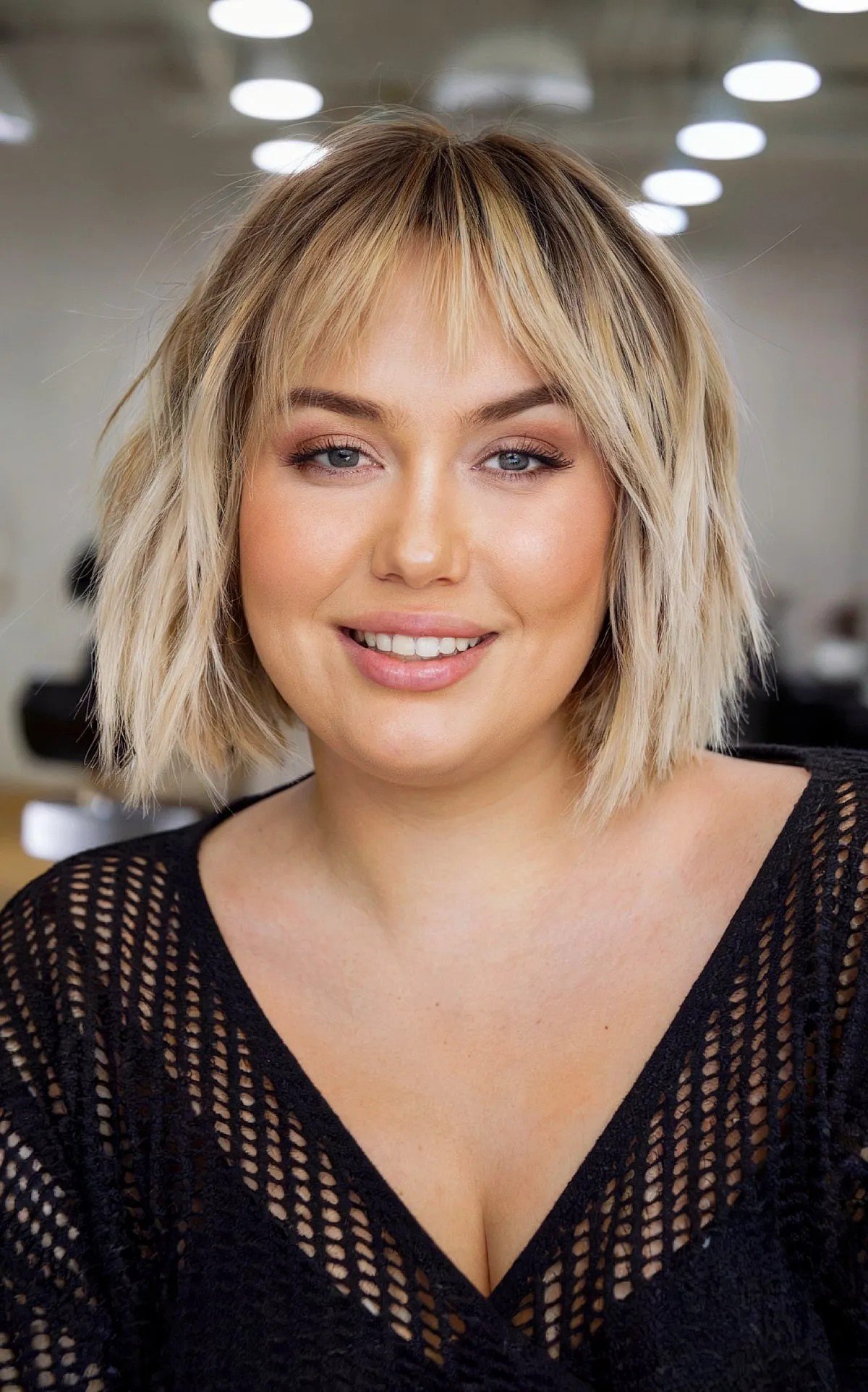 27 Flattering Bob Cuts with Bangs for Women with Round Faces
