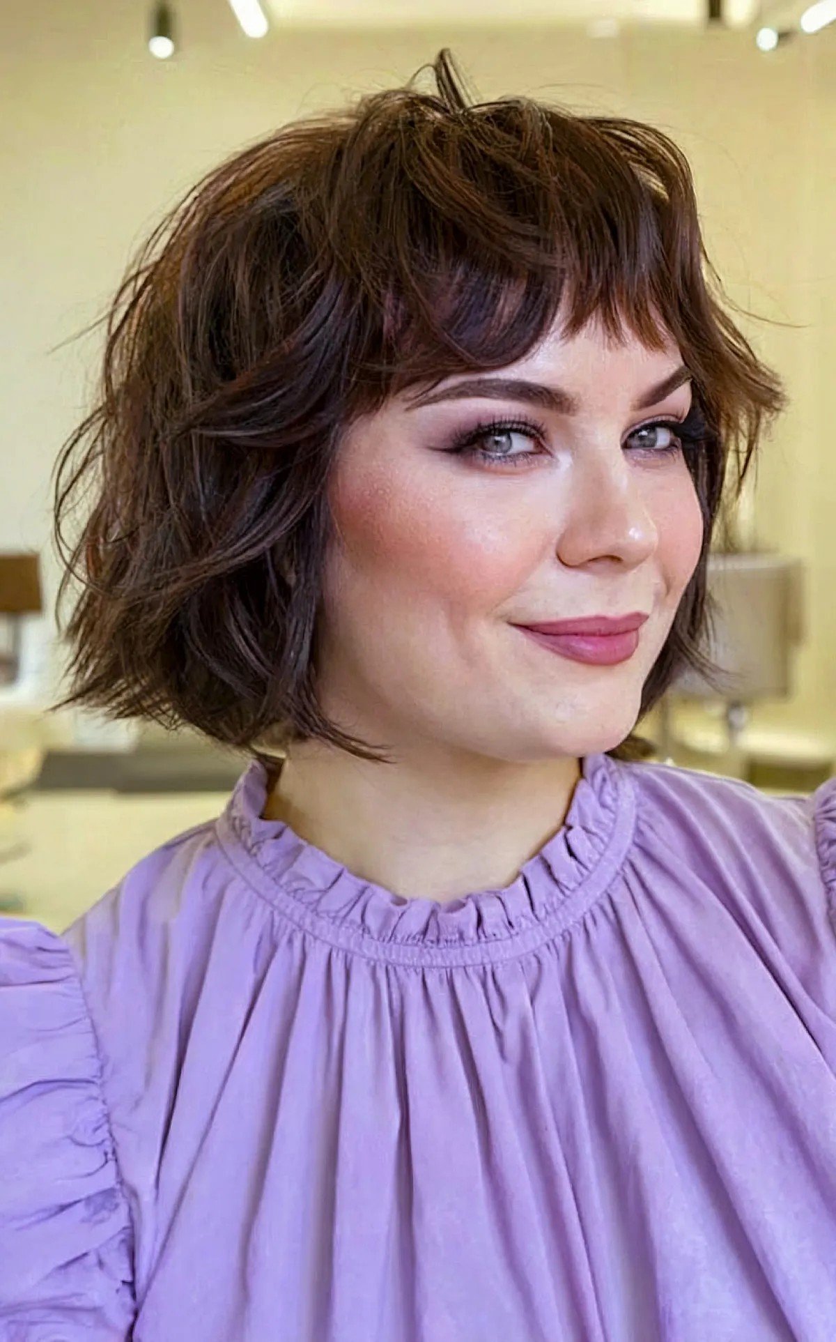 27 Flattering Bob Cuts with Bangs for Women with Round Faces