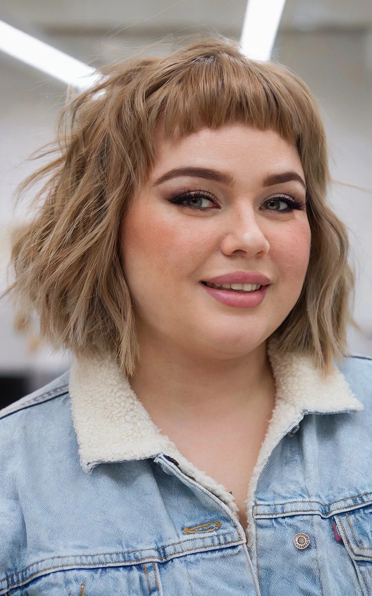 27 Flattering Bob Cuts with Bangs for Women with Round Faces