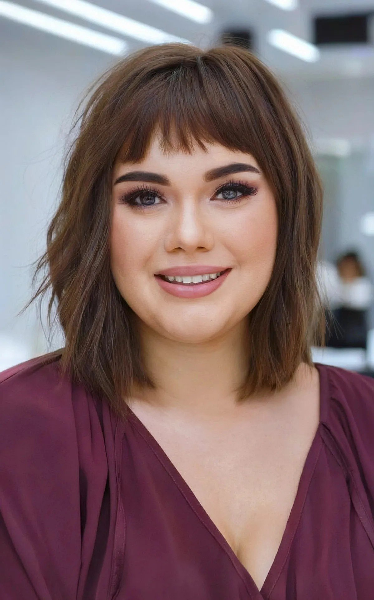 27 Flattering Bob Cuts with Bangs for Women with Round Faces