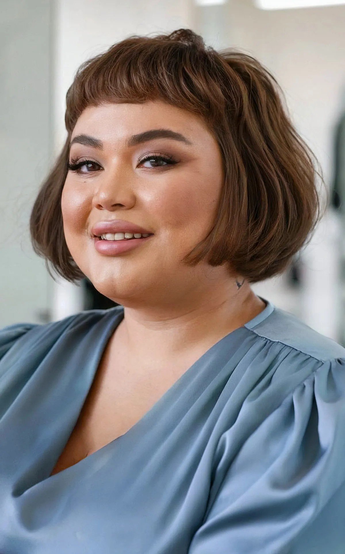 27 Flattering Bob Cuts with Bangs for Women with Round Faces