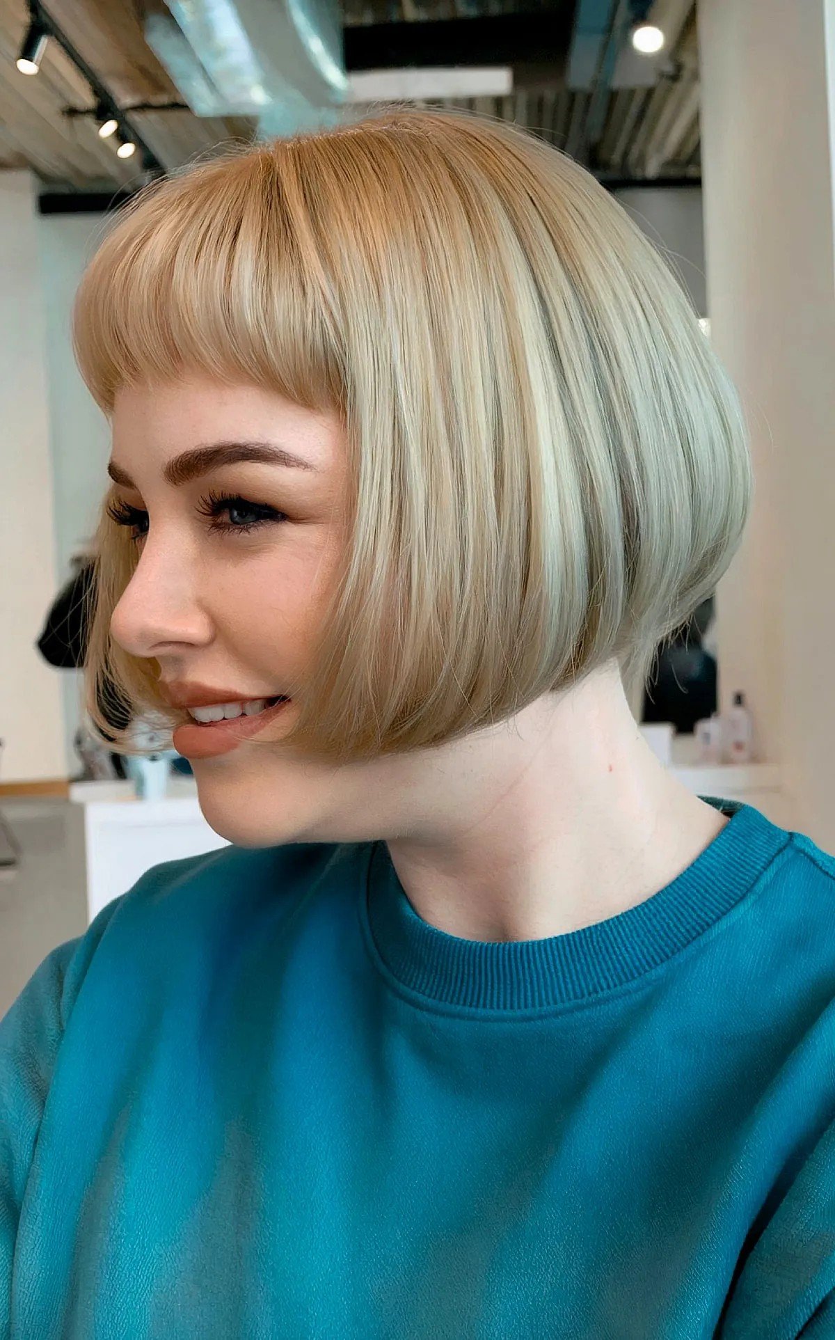 27 Flattering Bob Cuts with Bangs for Women with Round Faces