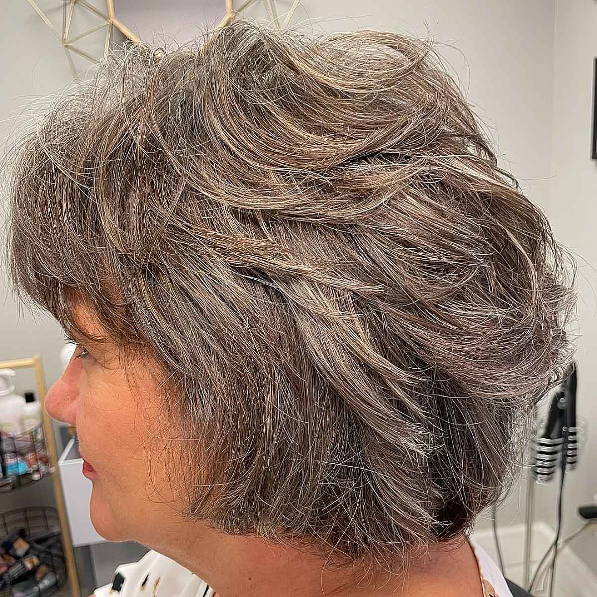 29 Feathered Bob Haircuts That Add Fullness & Movement to Your Hair