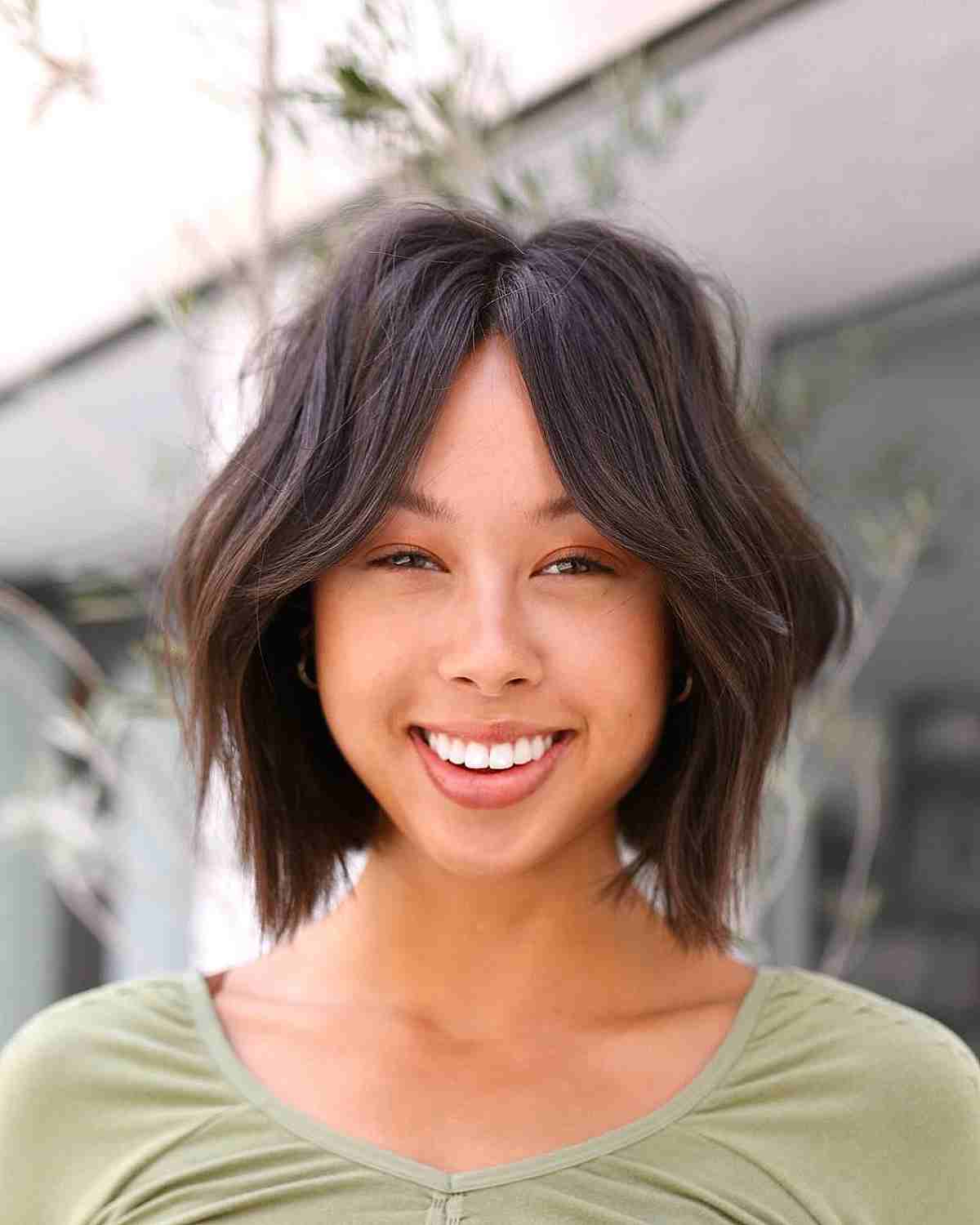 27 Cutest Wavy Bobs with Bangs Women Are Getting Right Now