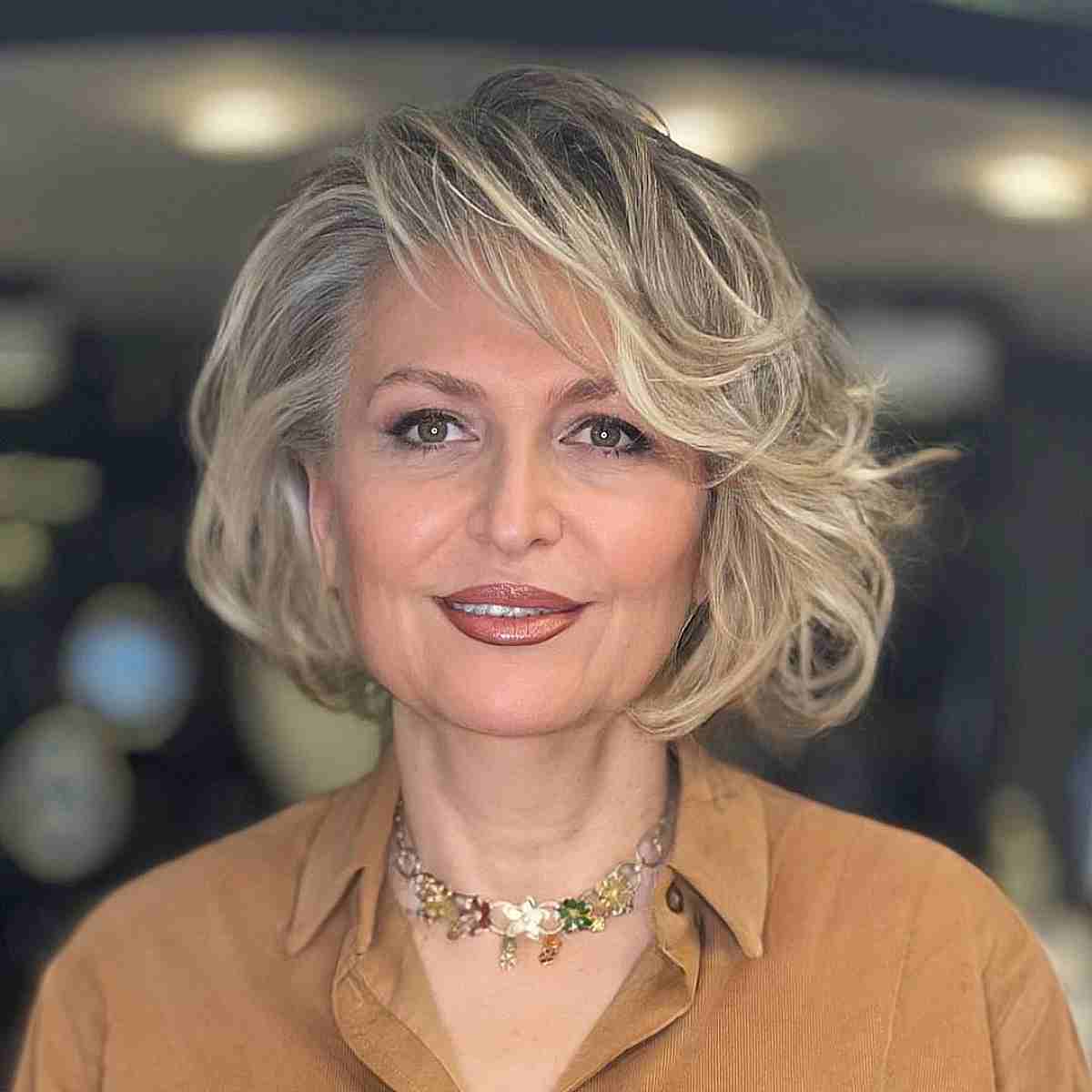 27 Cutest Wavy Bobs with Bangs Women Are Getting Right Now