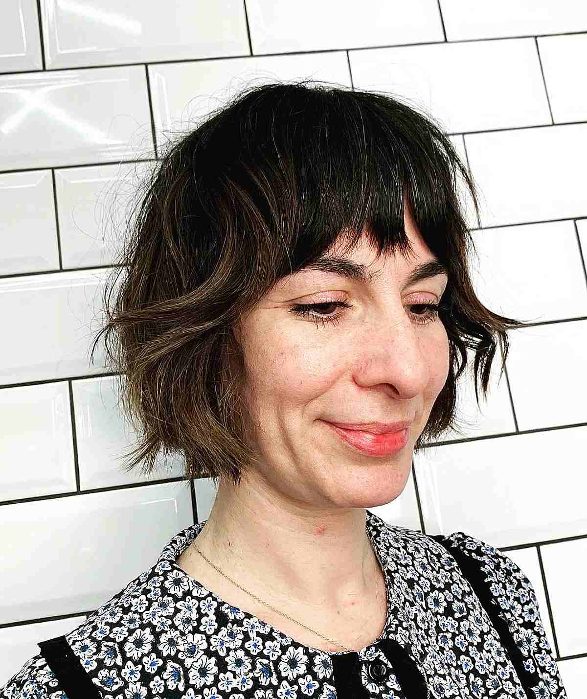 27 Cutest Wavy Bobs with Bangs Women Are Getting Right Now