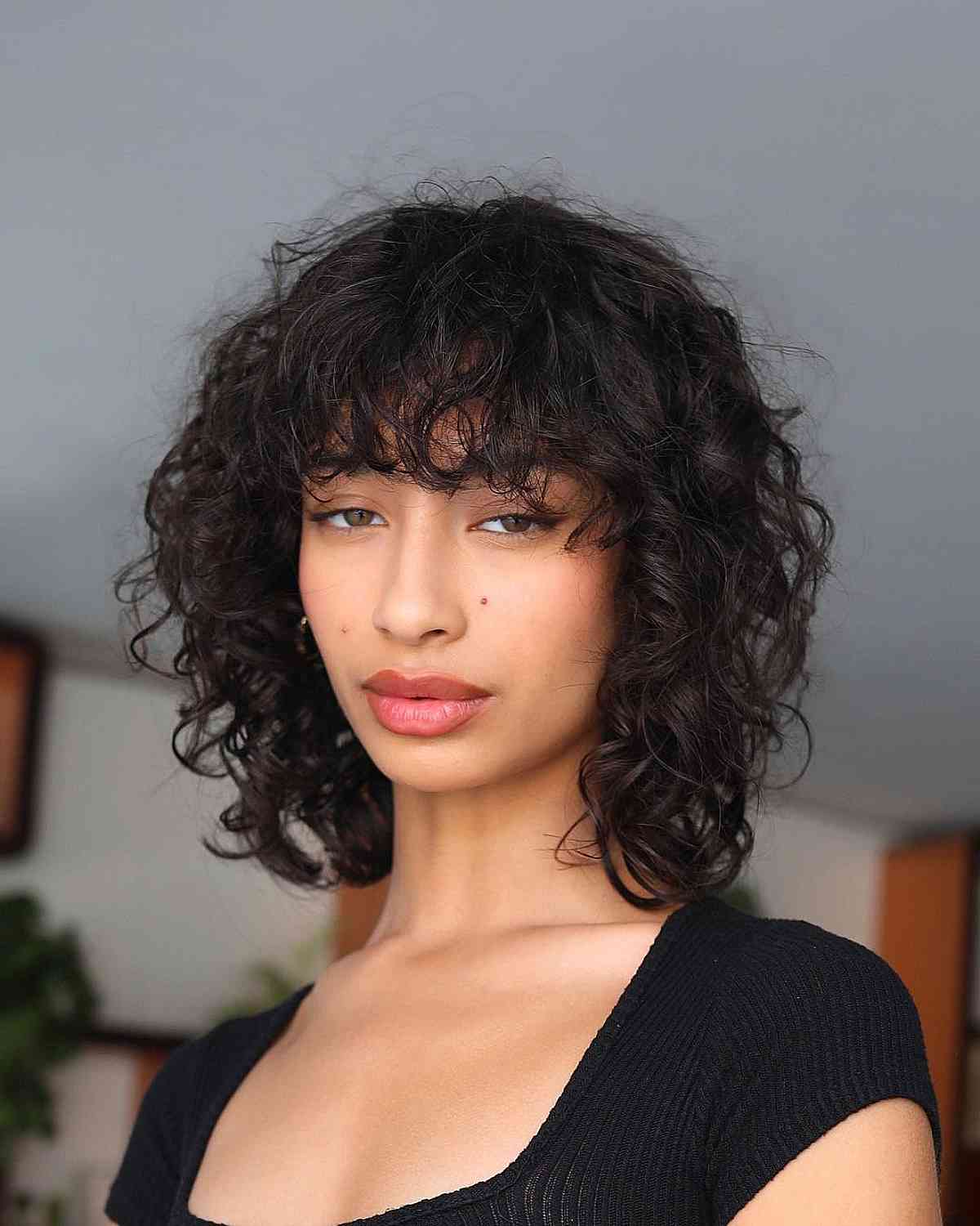 28 Best Curly Bob with Bangs for the Most Flattering Haircut & Hairstyle