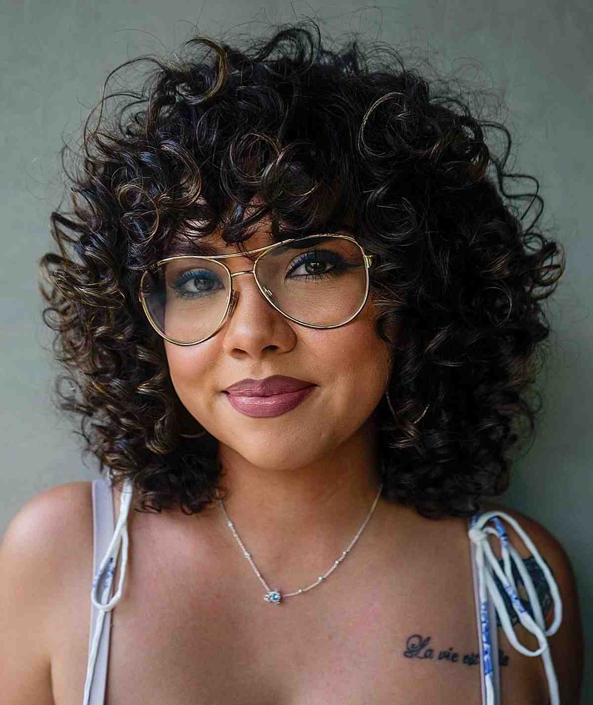 28 Best Curly Bob with Bangs for the Most Flattering Haircut & Hairstyle