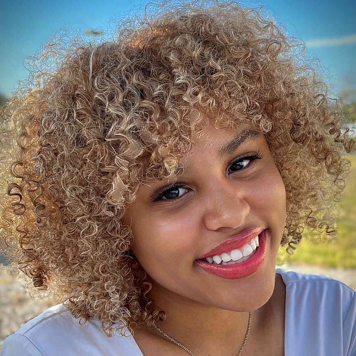 28 Best Curly Bob with Bangs for the Most Flattering Haircut & Hairstyle