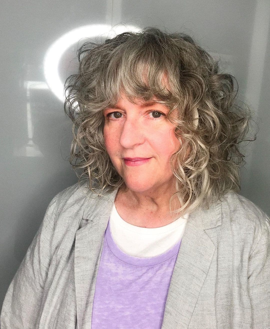 28 Best Curly Bob with Bangs for the Most Flattering Haircut & Hairstyle