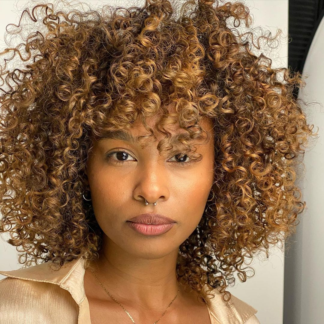 28 Best Curly Bob with Bangs for the Most Flattering Haircut & Hairstyle