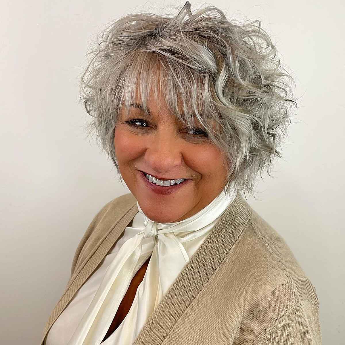 28 Best Curly Bob with Bangs for the Most Flattering Haircut & Hairstyle