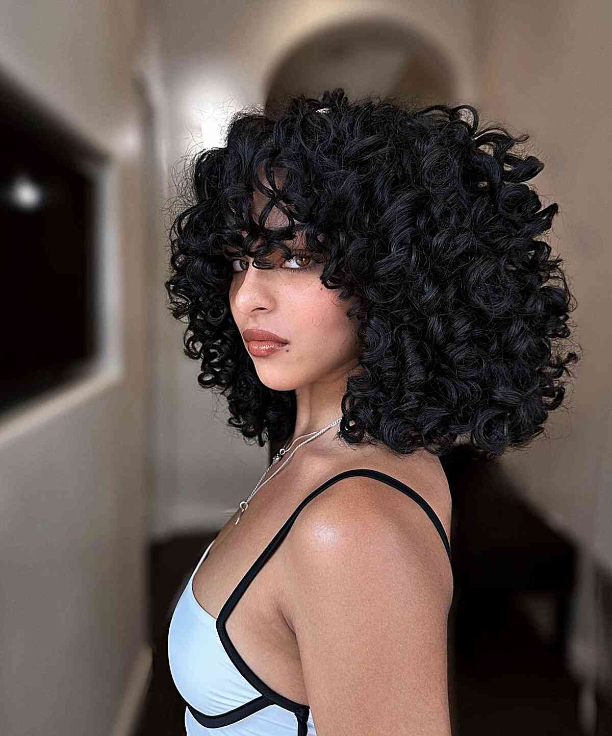 76 Top Shoulder-Length Curly Haircuts &amp; Styles for 2025