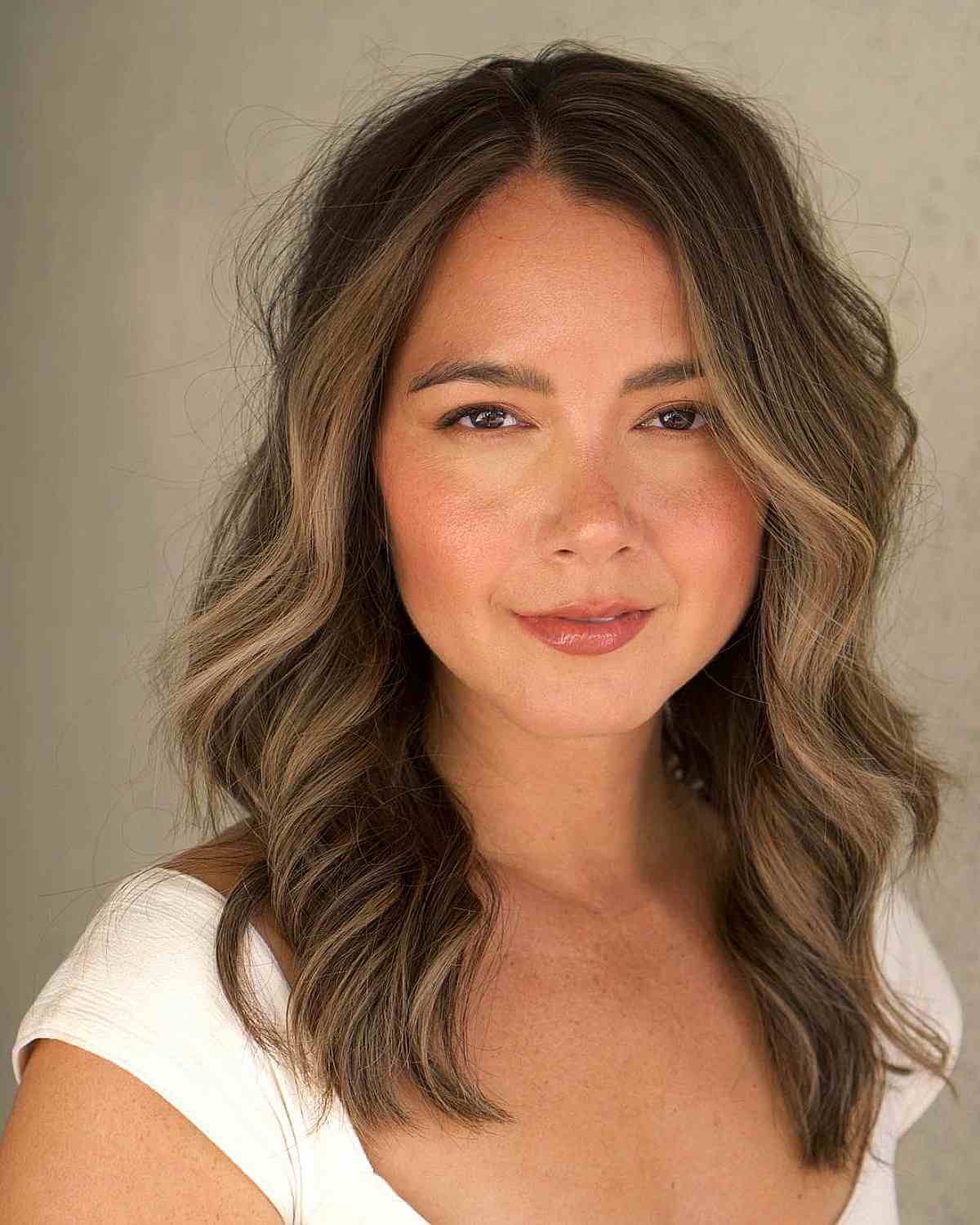 67 Exceptional Haircuts for Round Faces in 2025