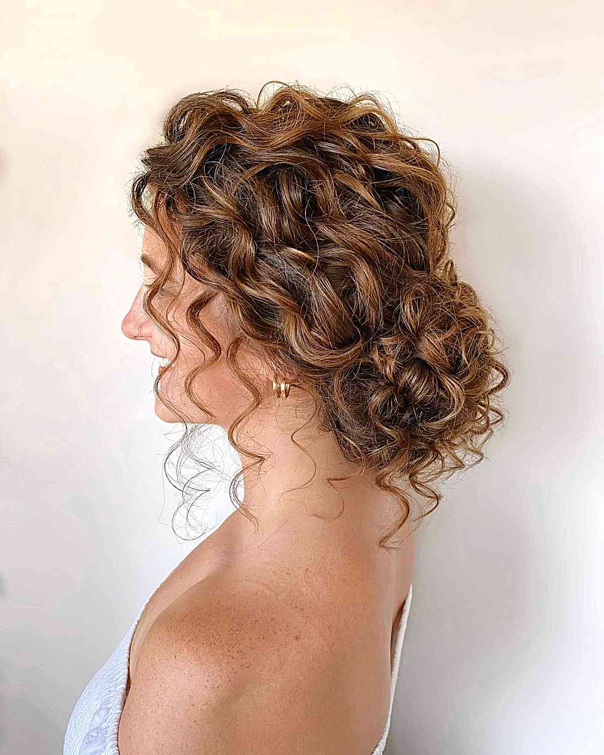 33 Easy & Cute Curly Hair Updos in Trending in 2025